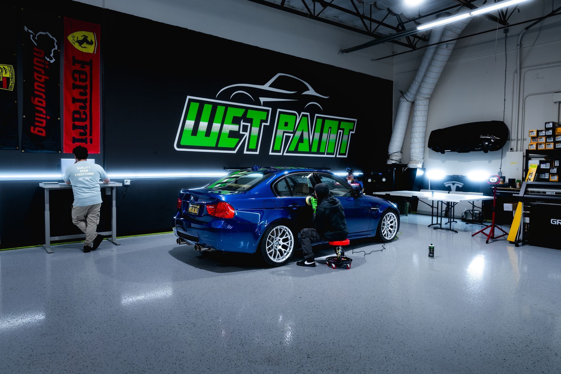 Blue car in a car shop with a 