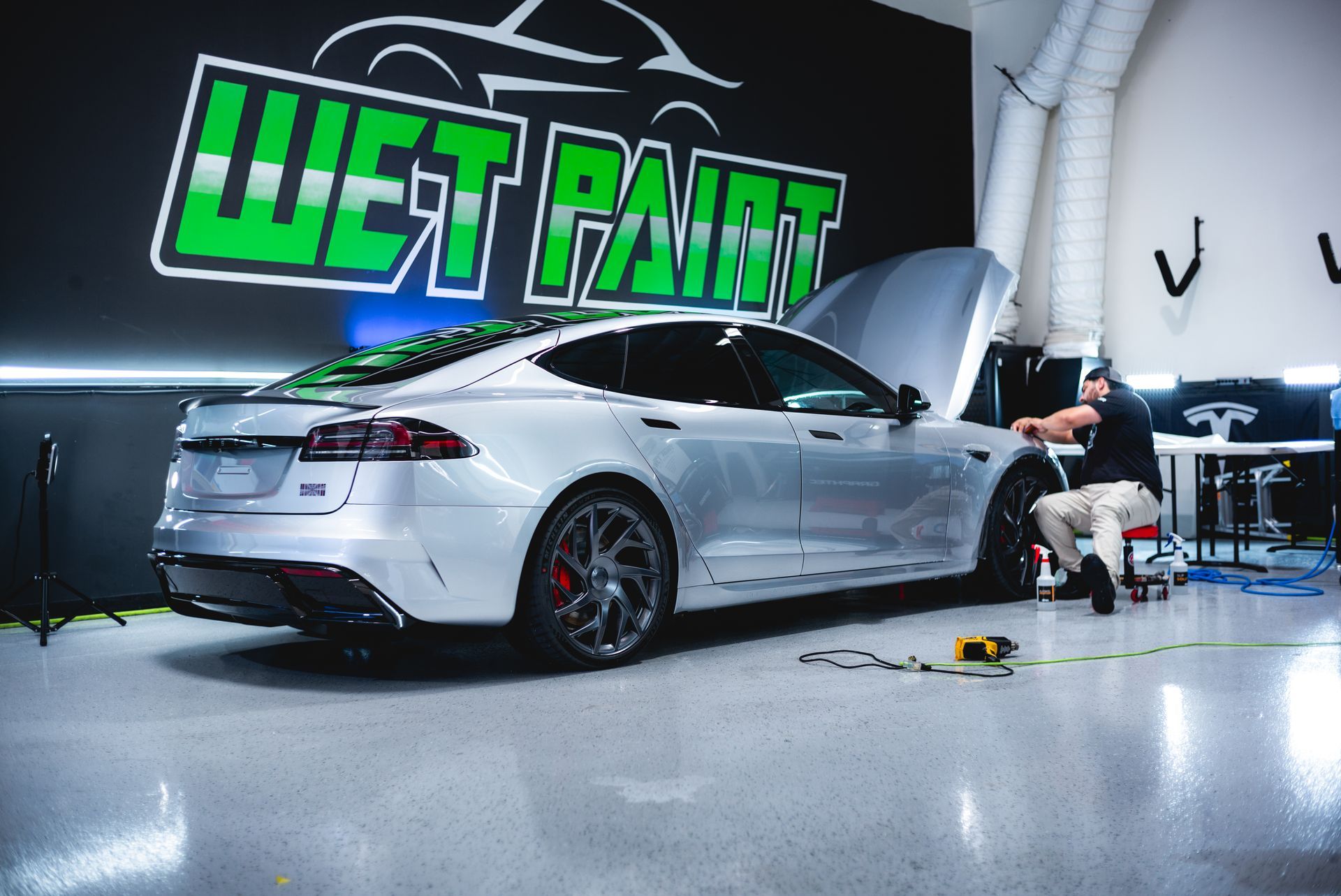 silver car parked in a garage