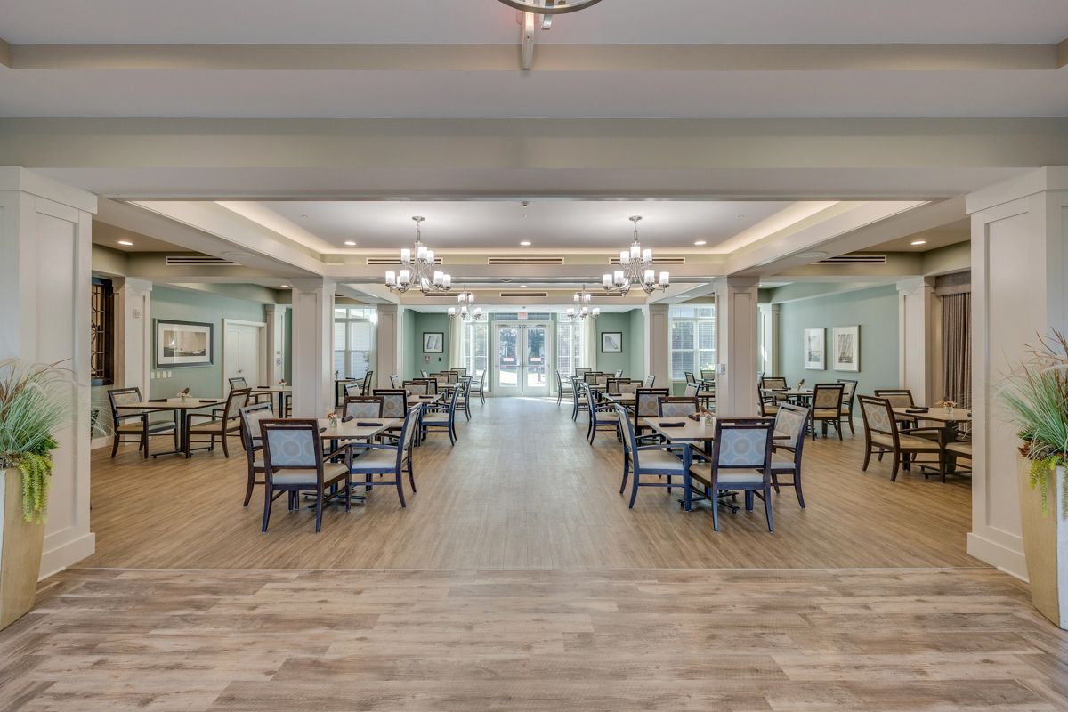 A large dining room filled with tables and chairs.