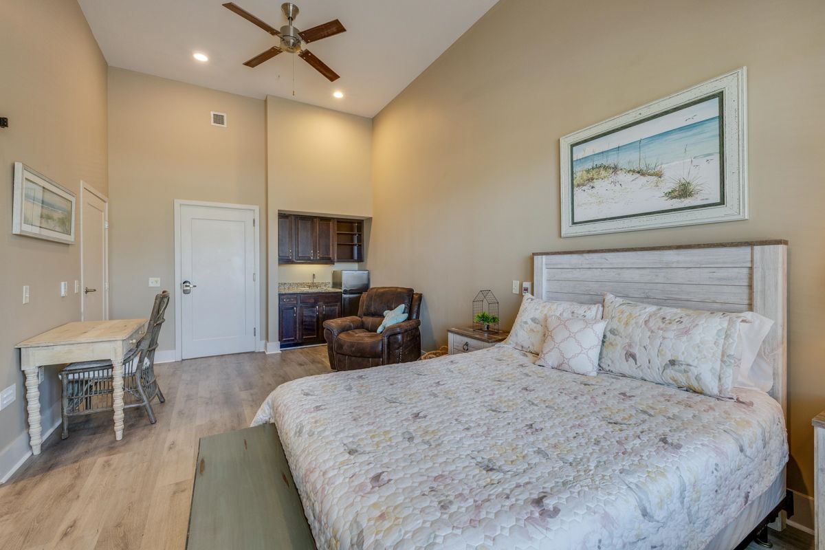 There is a large bed in the middle of the room.