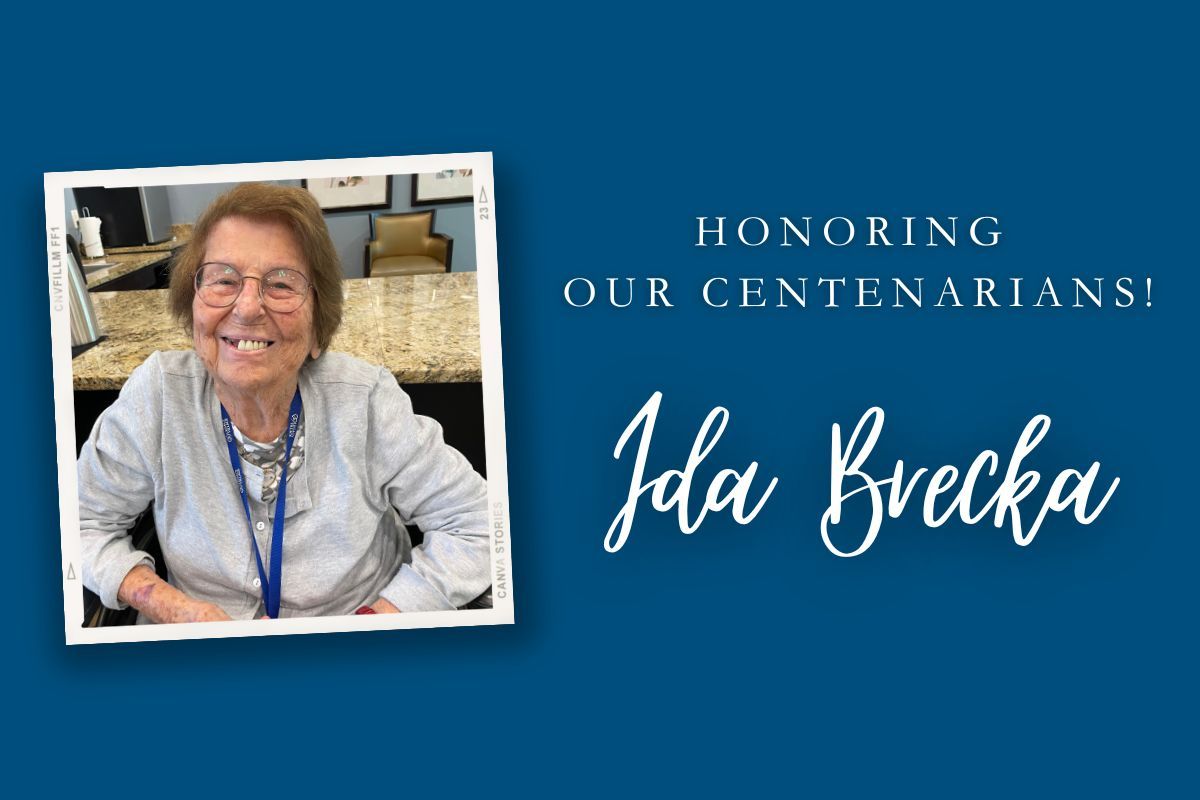 A picture of an elderly woman on a blue background with the words honoring our centenarians.