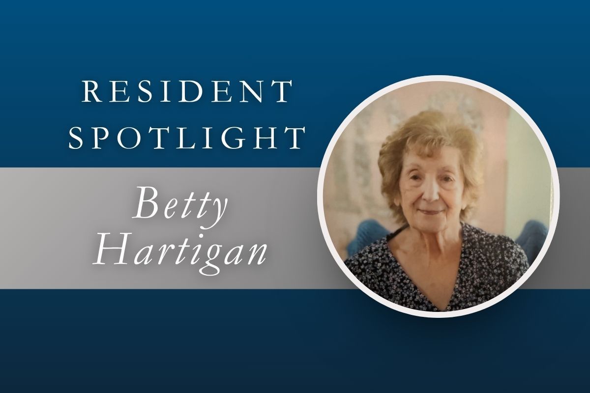 Resident Spotlight: Betty Hartigan. Woman in a circle smiling.