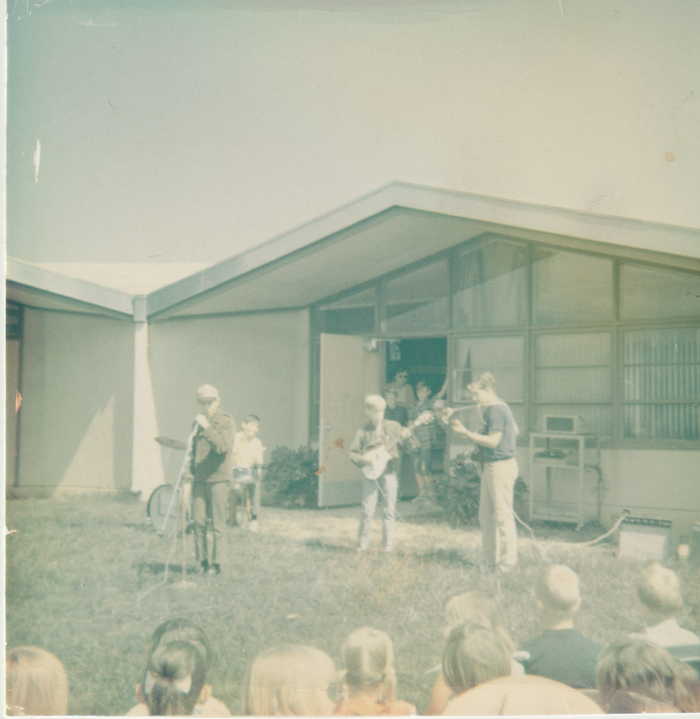 A group of children playing instruments