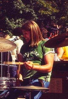 A man playing drums at a concert