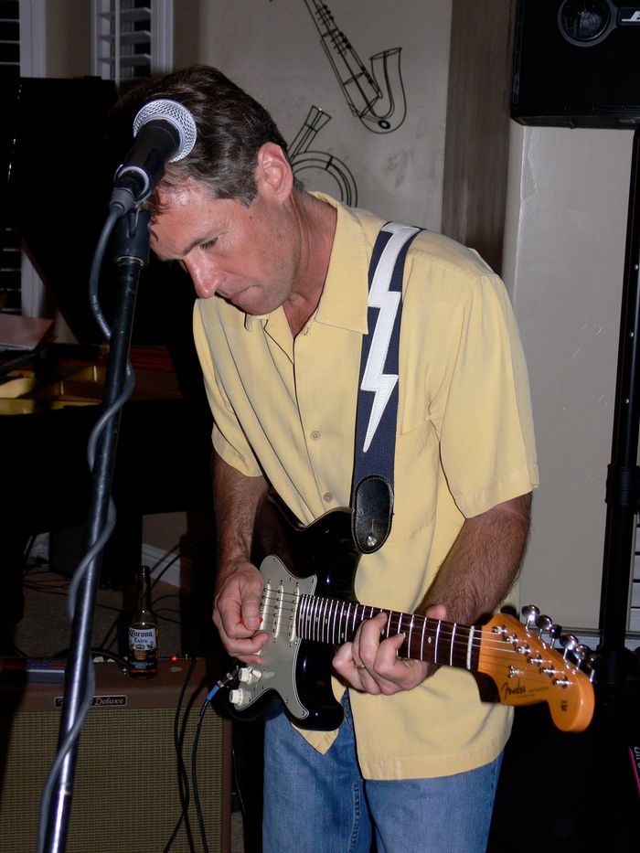 A man playing guitar