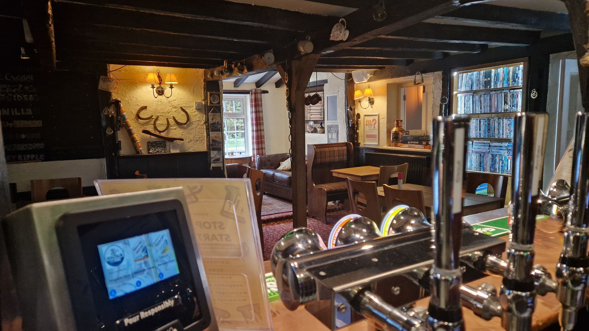 Main bar of the pub, where you can pour your own beer (summer and winter!)