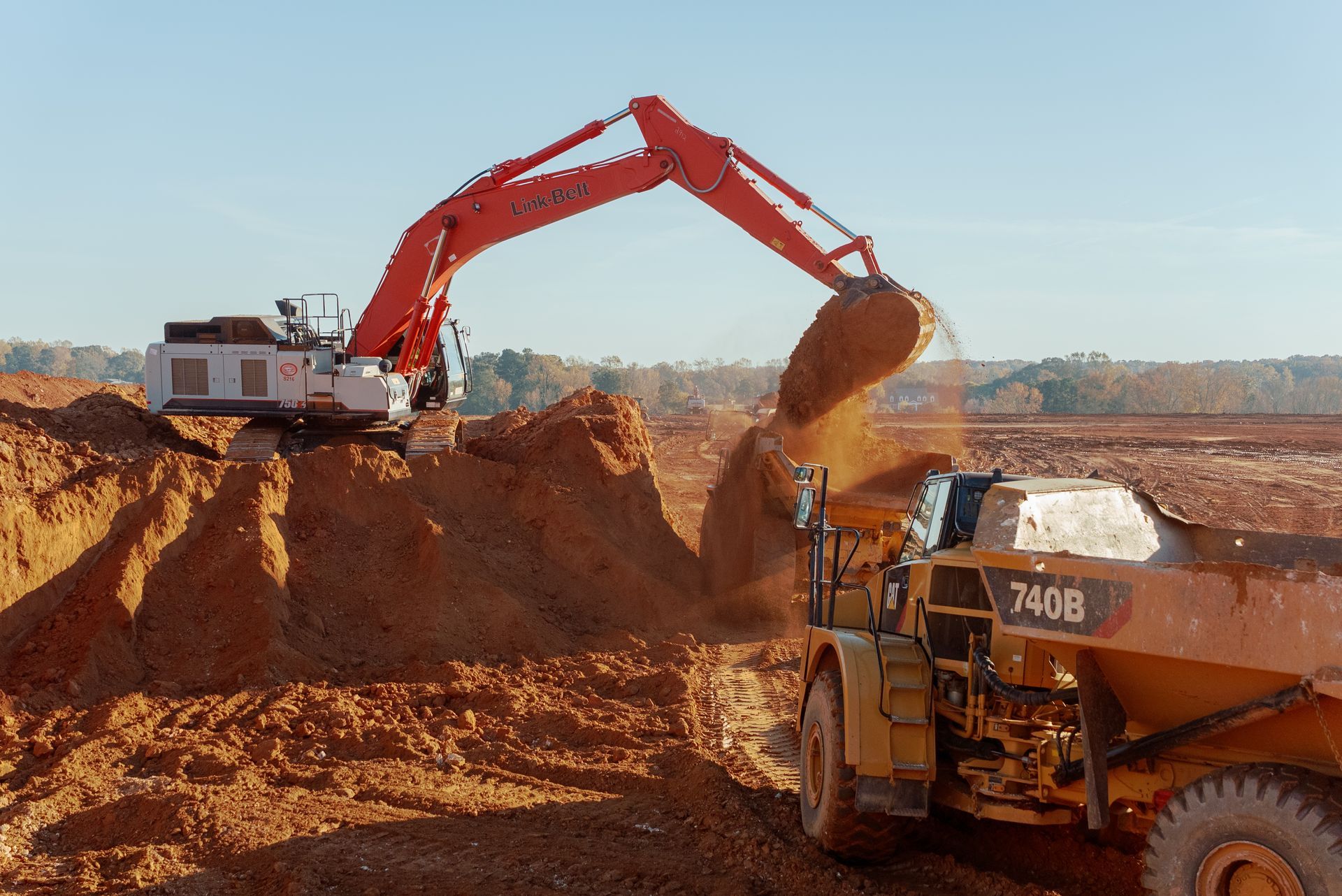 Commercial Grading — Two Yellow Excavation Truck in Gainesville, GA