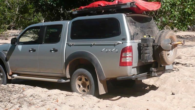 A silver 4WD with the word 4x4 on the side
