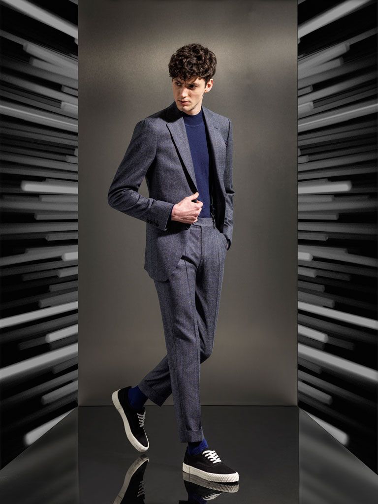 Grey flannel suit over blue turtleneck