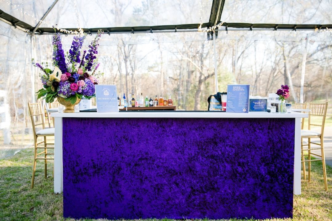 purple fabric bar at corporate holiday party