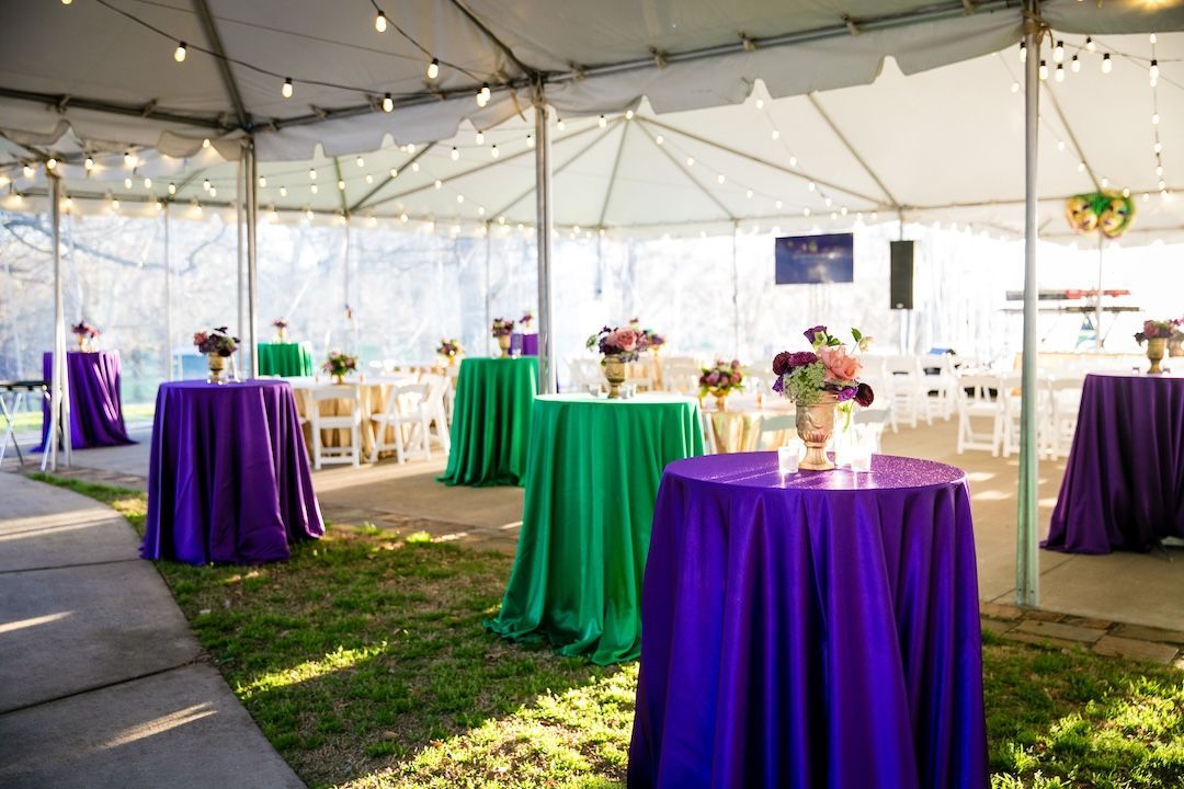 purple green corporate party tent setup