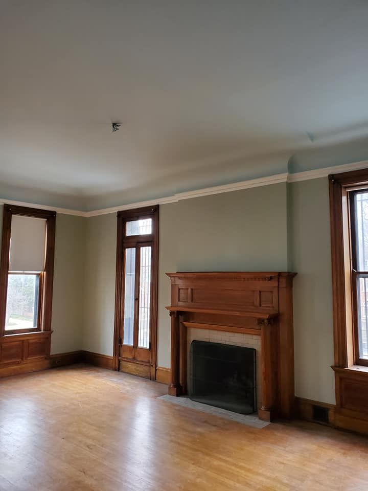 There is a fireplace in the middle of the room.