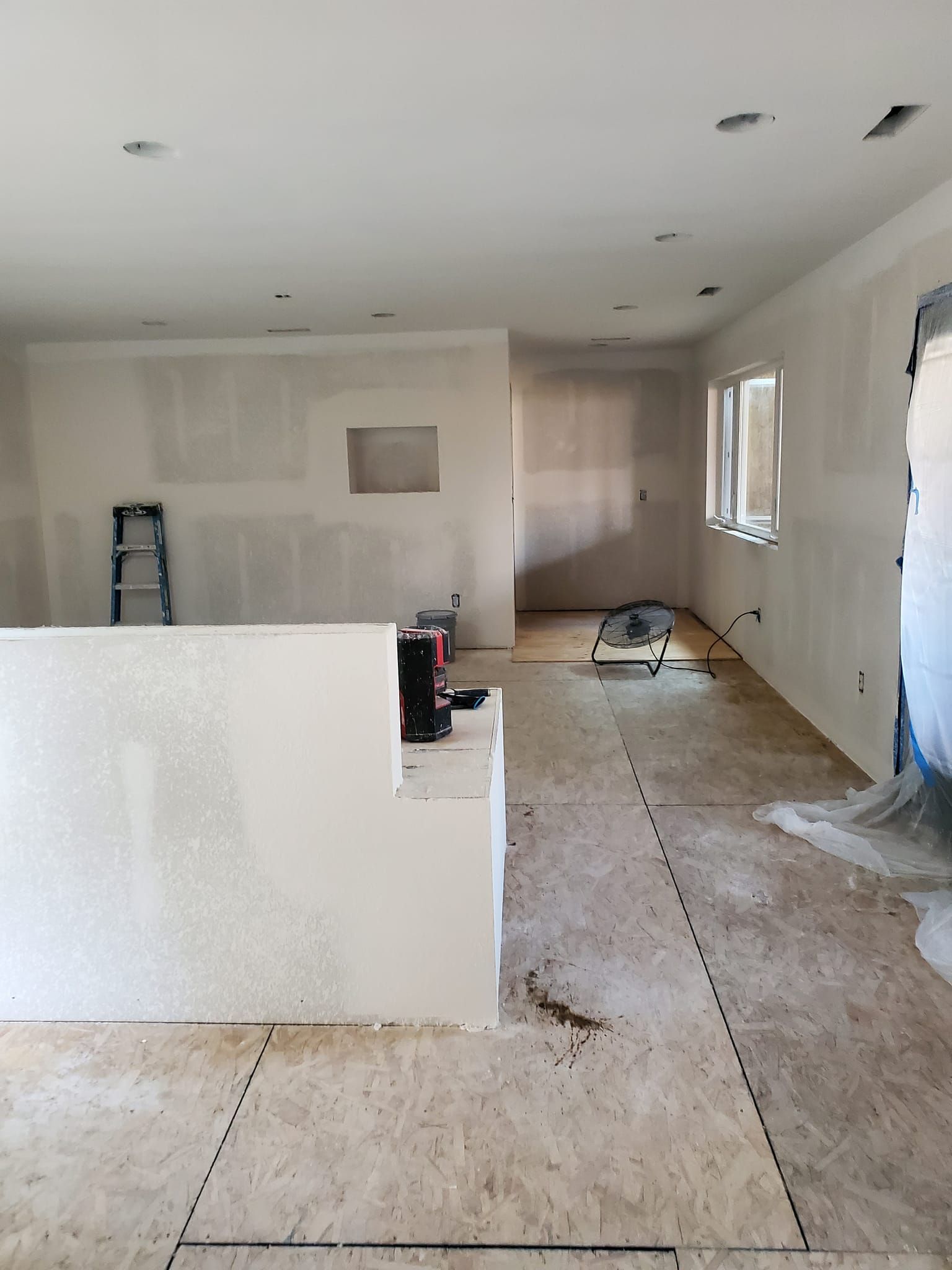 There is a ladder in the middle of the room.