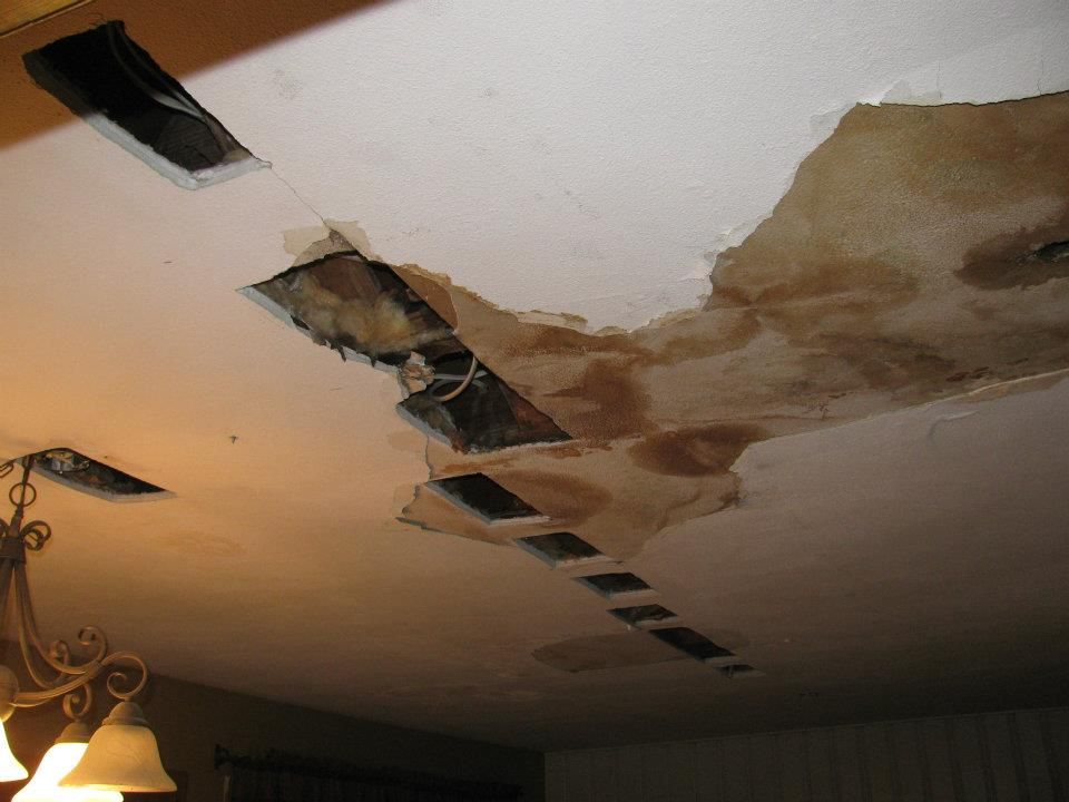 A ceiling with a lot of holes in it