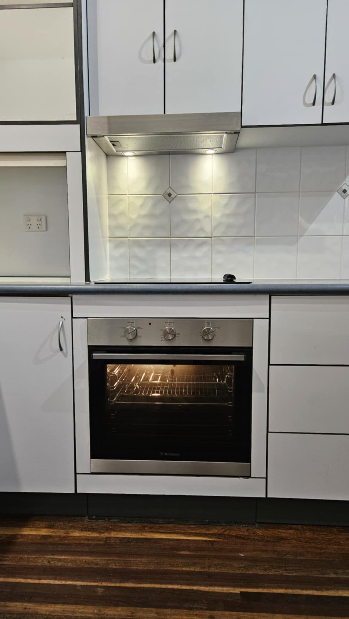 Electrical Fuse Box With the Door Open, Revealing Circuit Breakers — Lit Energy in Seaforth, QLD