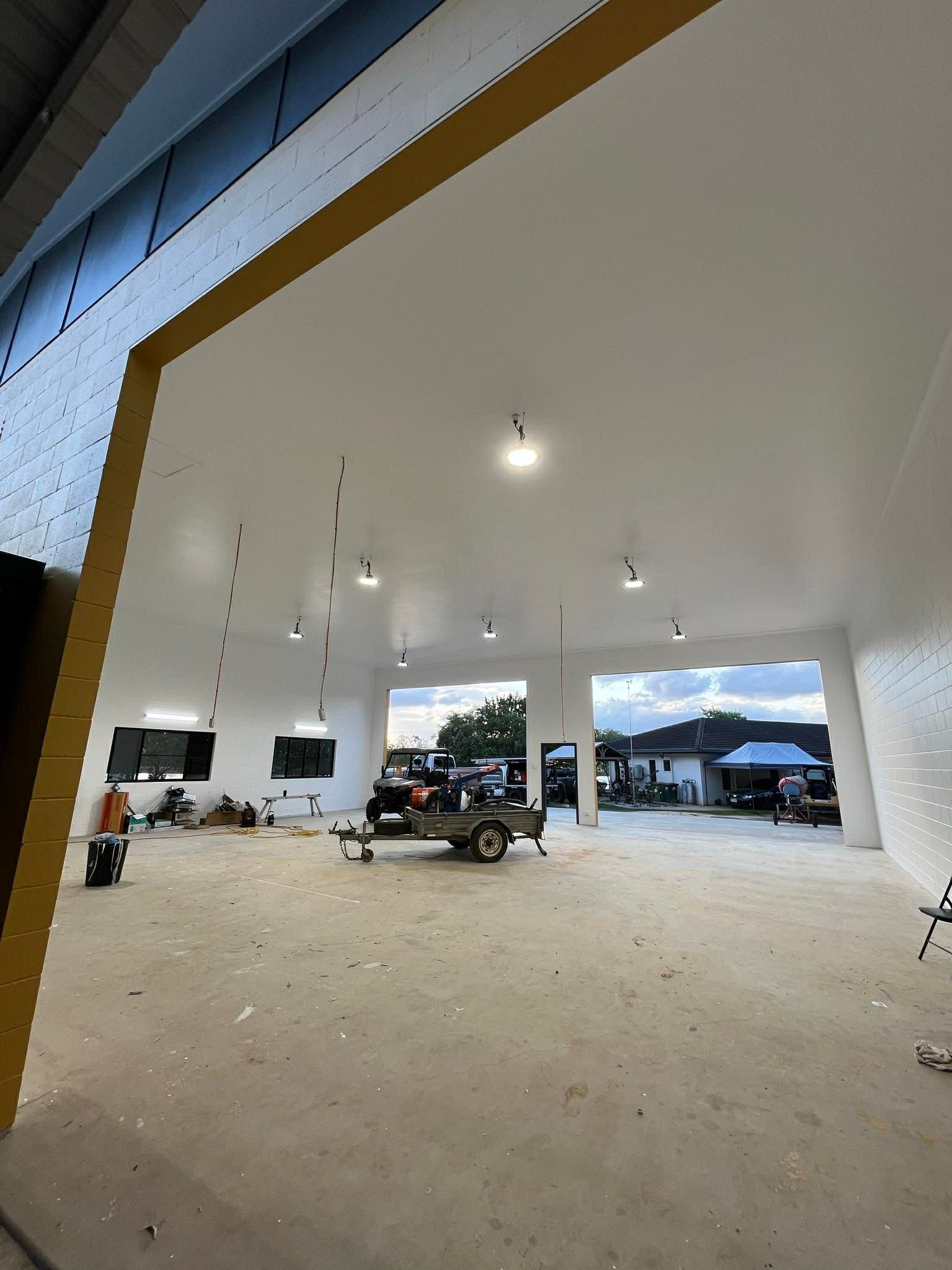 Electrical Room With Gray Metal Panels, Meters, and Conduit — Lit Energy in Seaforth, QLD