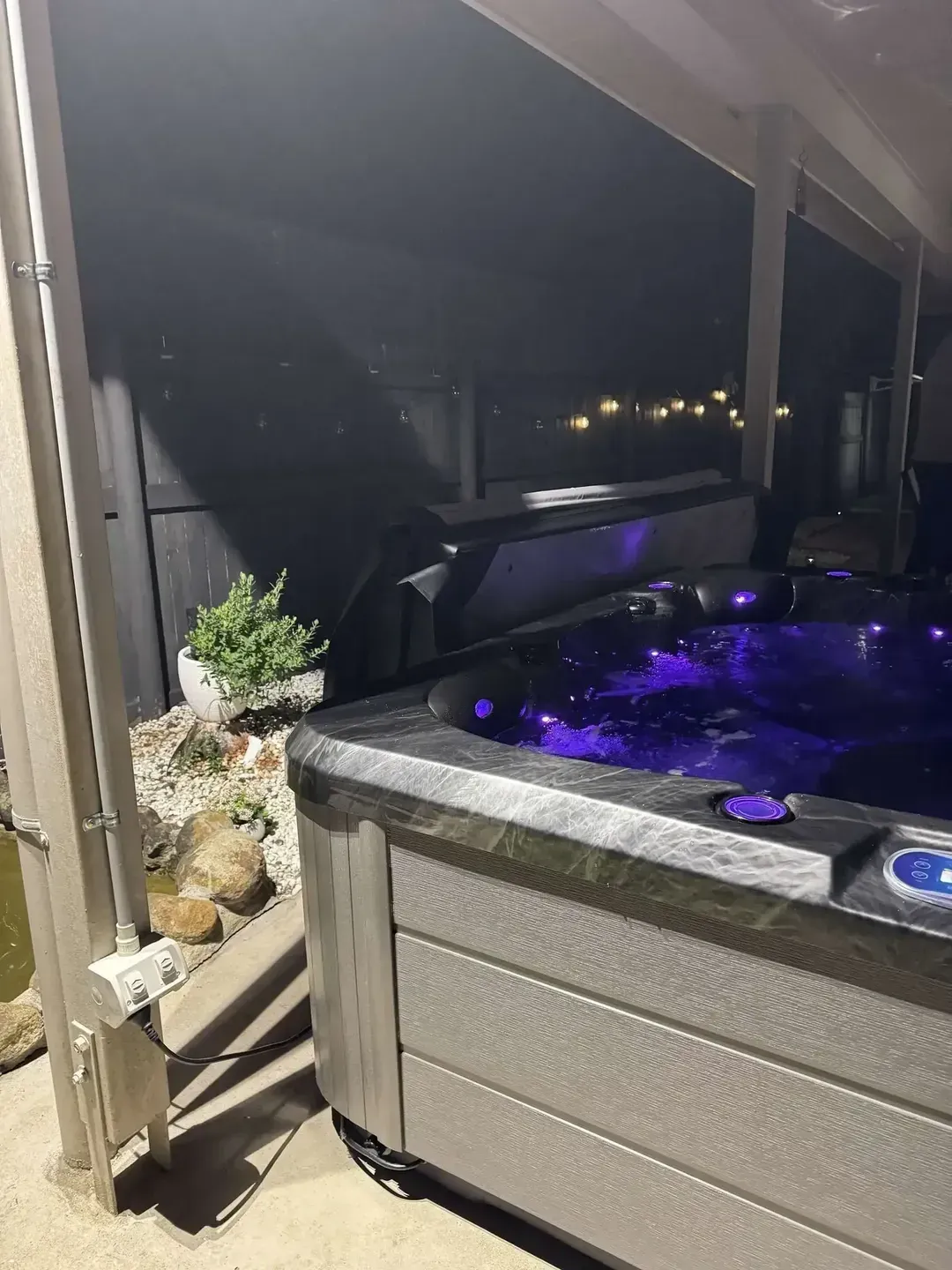 Hot Tub Glowing Purple Lights Under a Covered Patio at Night — Lit Energy in Rural View, QLD