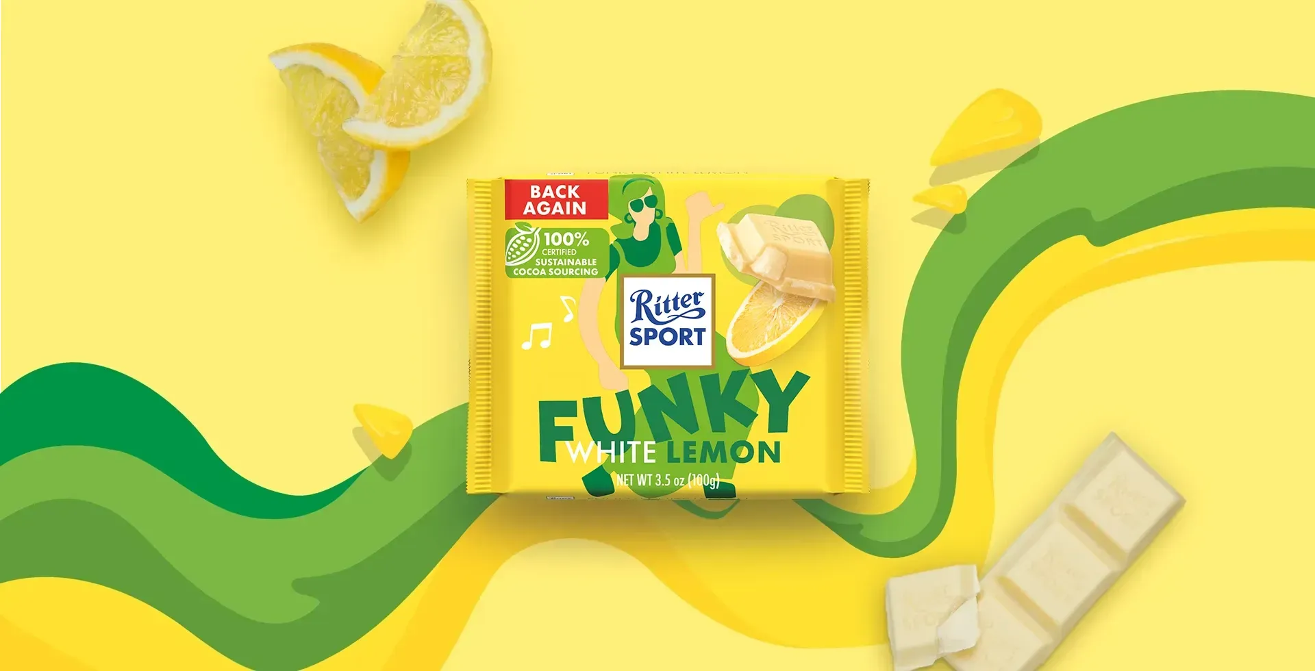 Ritter Sport chocolate bar packaging with cocoa beans, broken chocolate, and milk on a blue background.