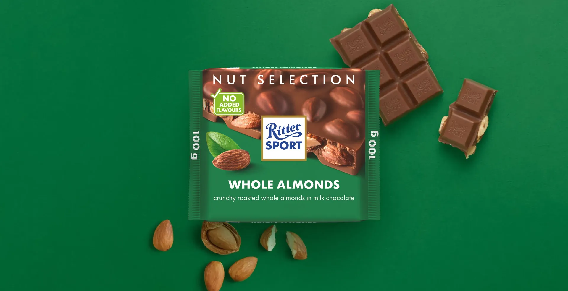 Ritter Sport chocolate bar packaging with cocoa beans, broken chocolate, and milk on a blue background.