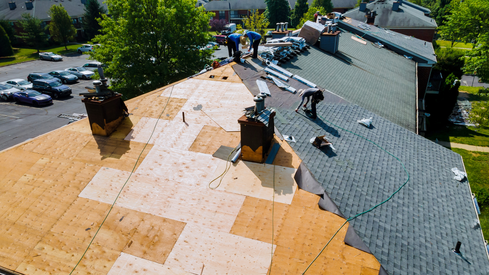 An aerial view of a roof being repaired in Layton, Utah