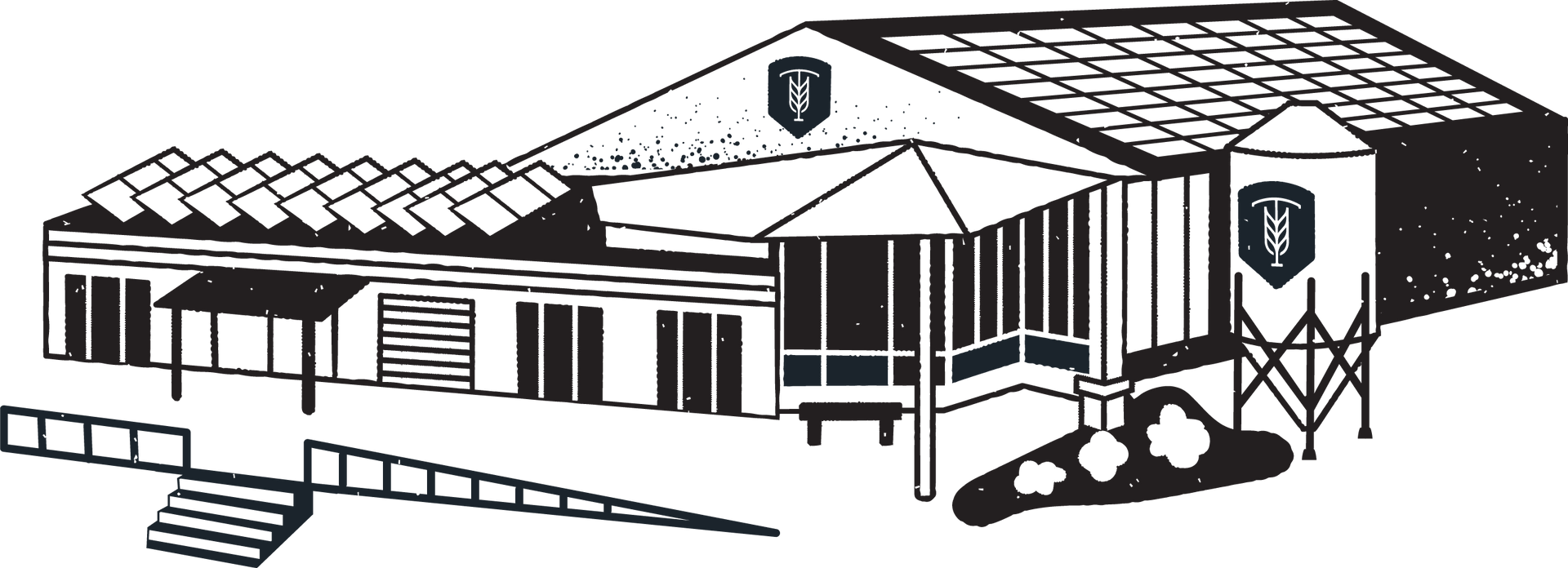 Building with logo, possibly a school or business, with ramps and steps in front.