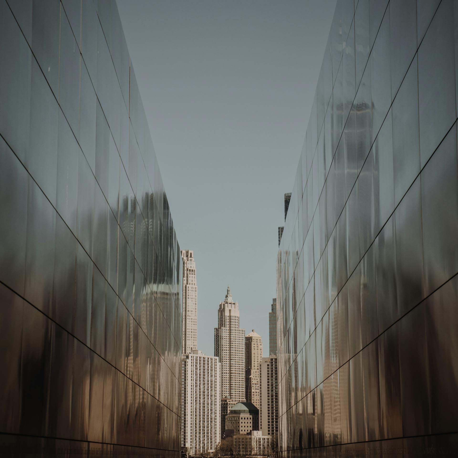 A view of a city skyline from the inside of a building.