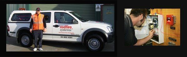 A man in an orange vest is standing next to a white truck that says reden spares