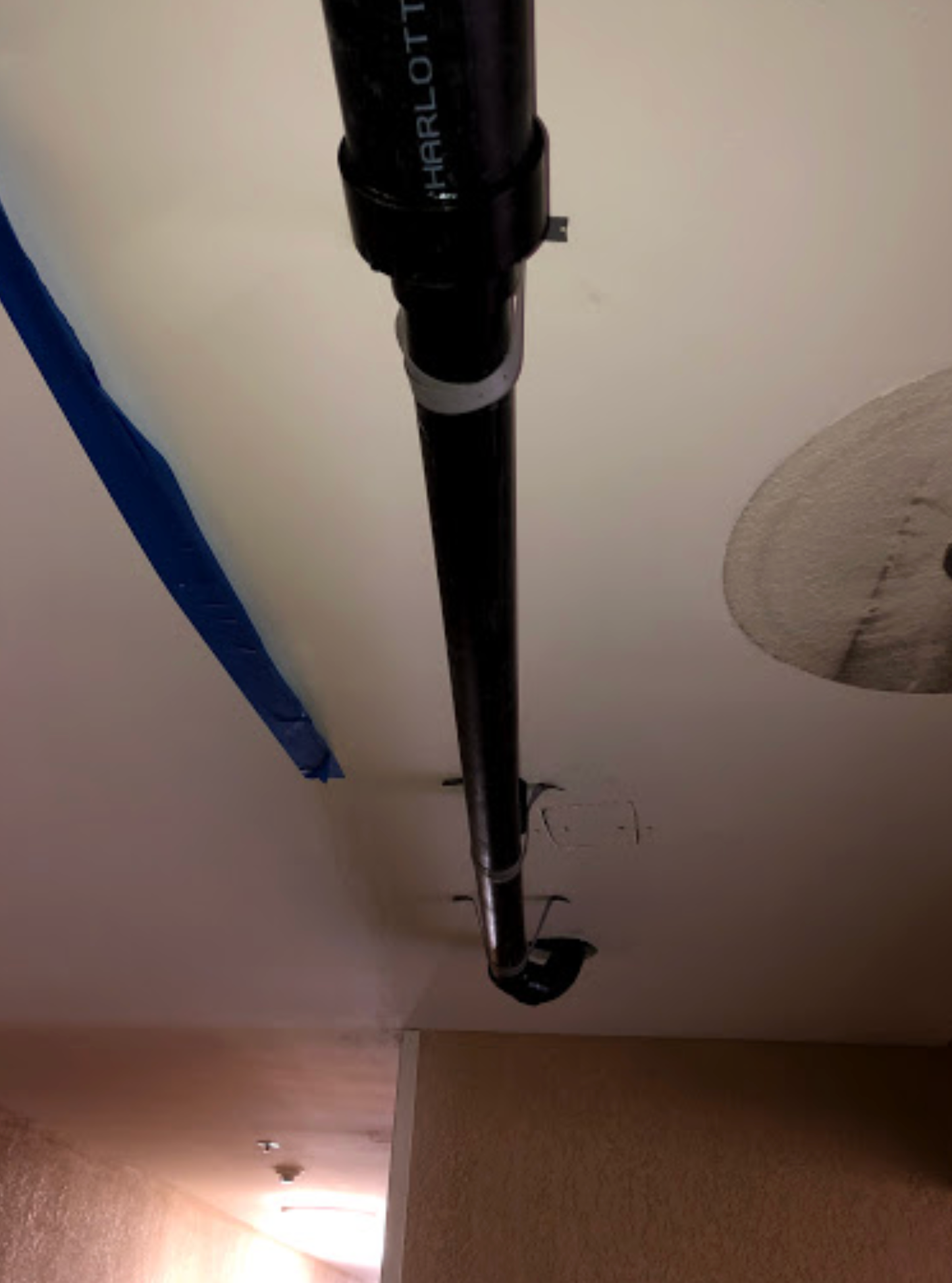 A philott pipe is hanging from the ceiling