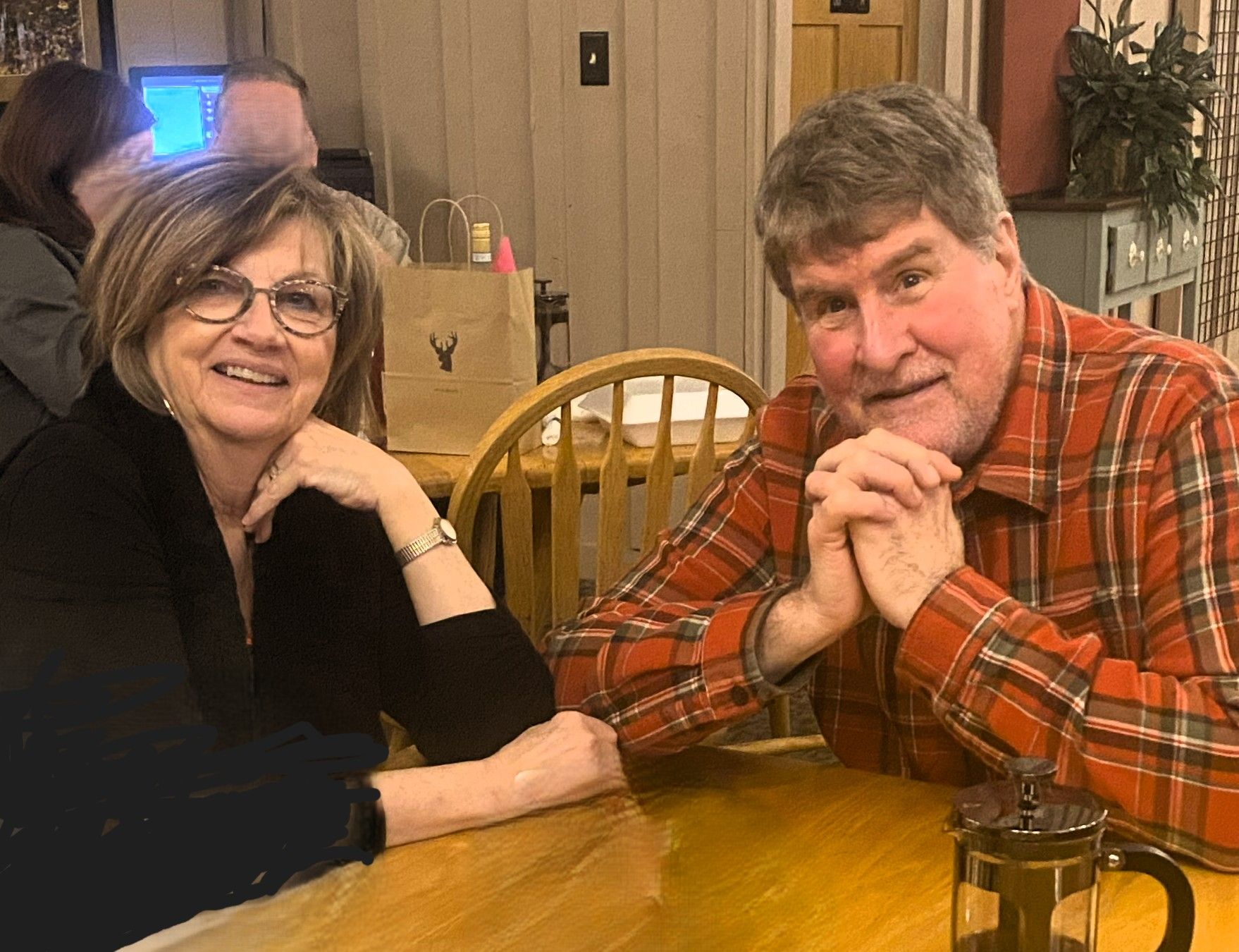 The Parker Team, Karen & Doug, posing for a picture in the Hide-A-Way Hills Lodge near The Hocking Hills