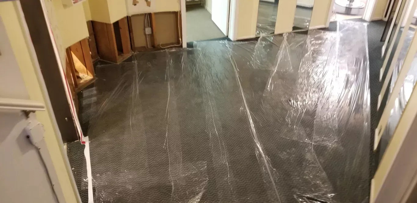 A hallway with a lot of water coming out of it.