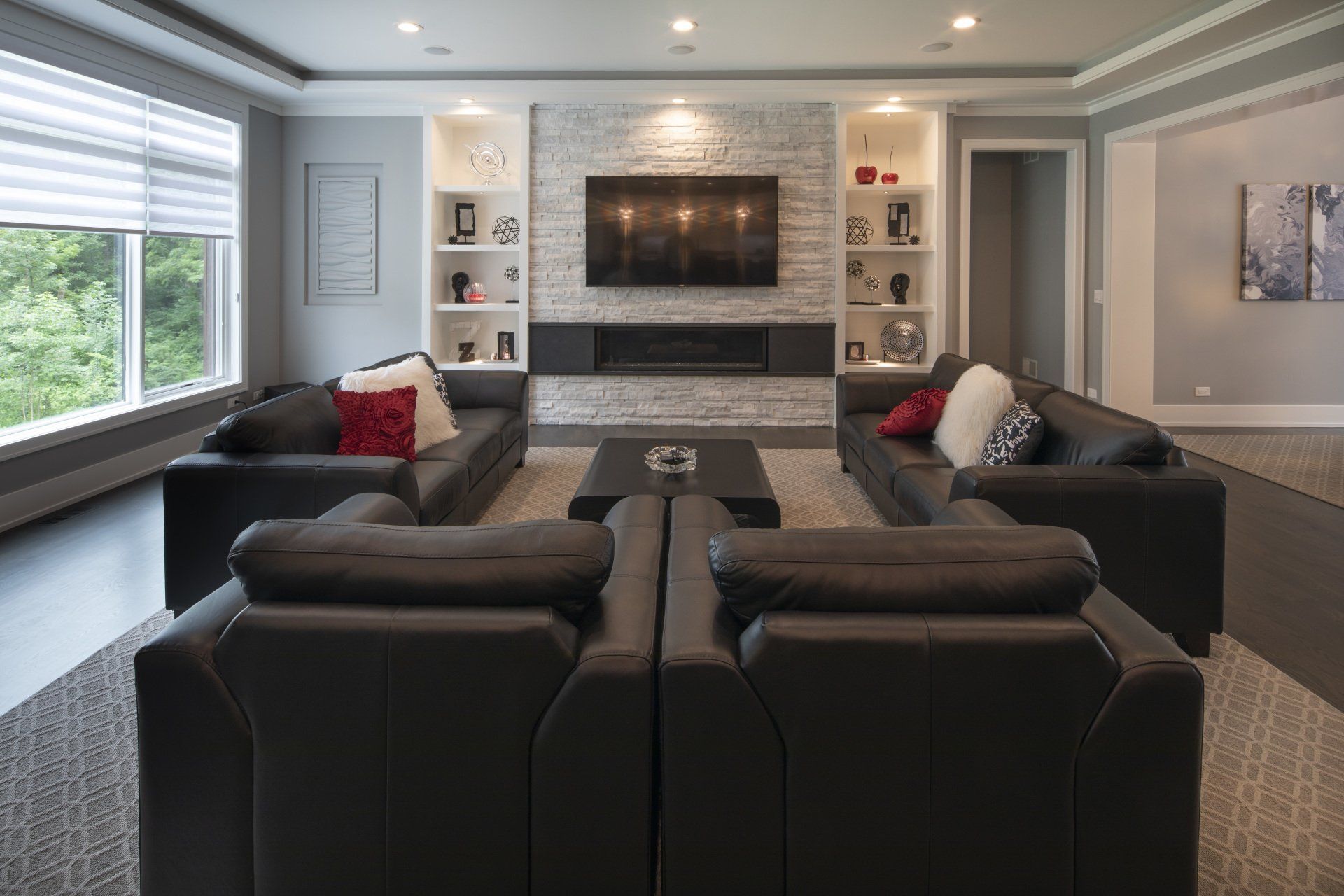 A living room filled with furniture and a flat screen tv.