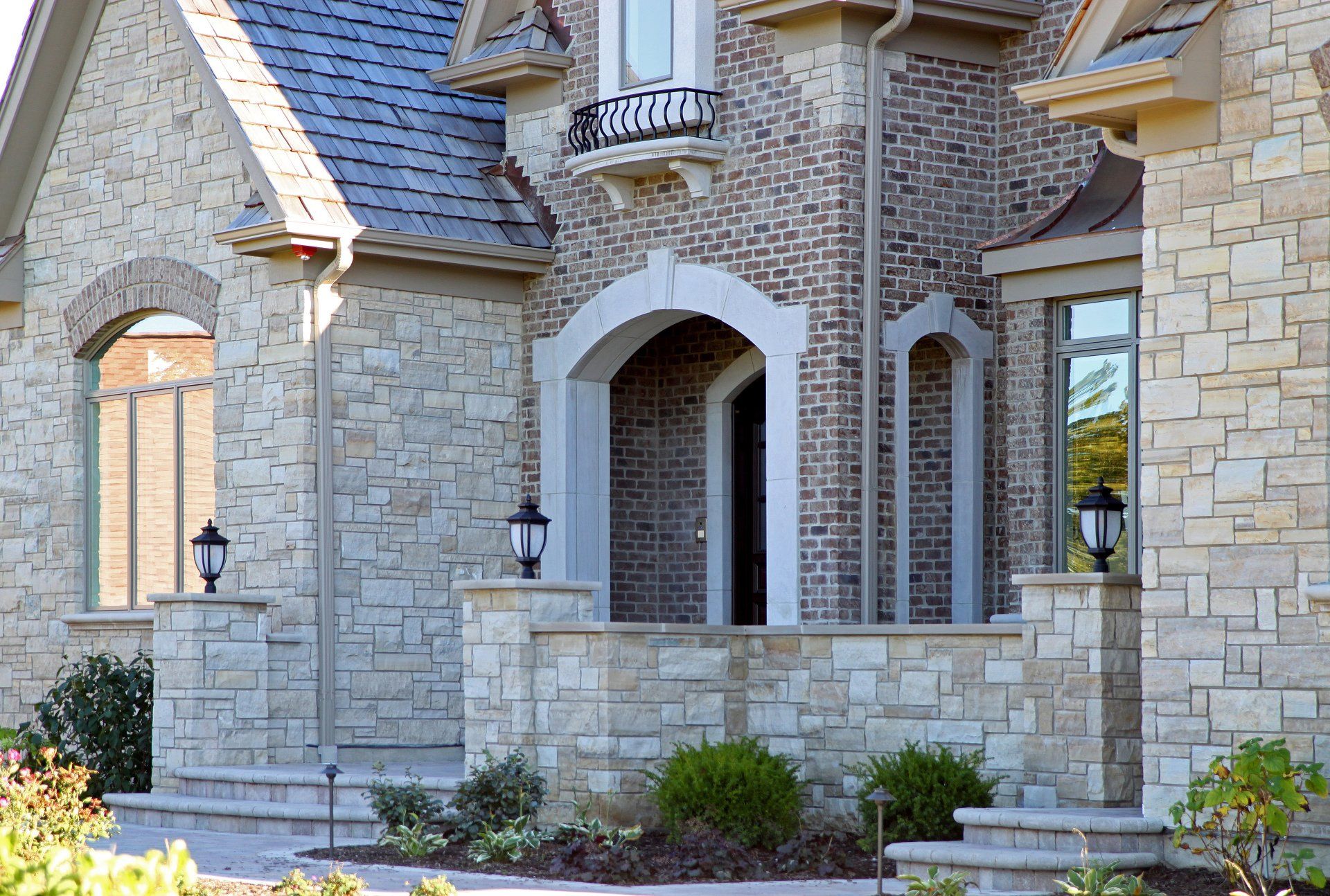 A large brick house with a slate roof