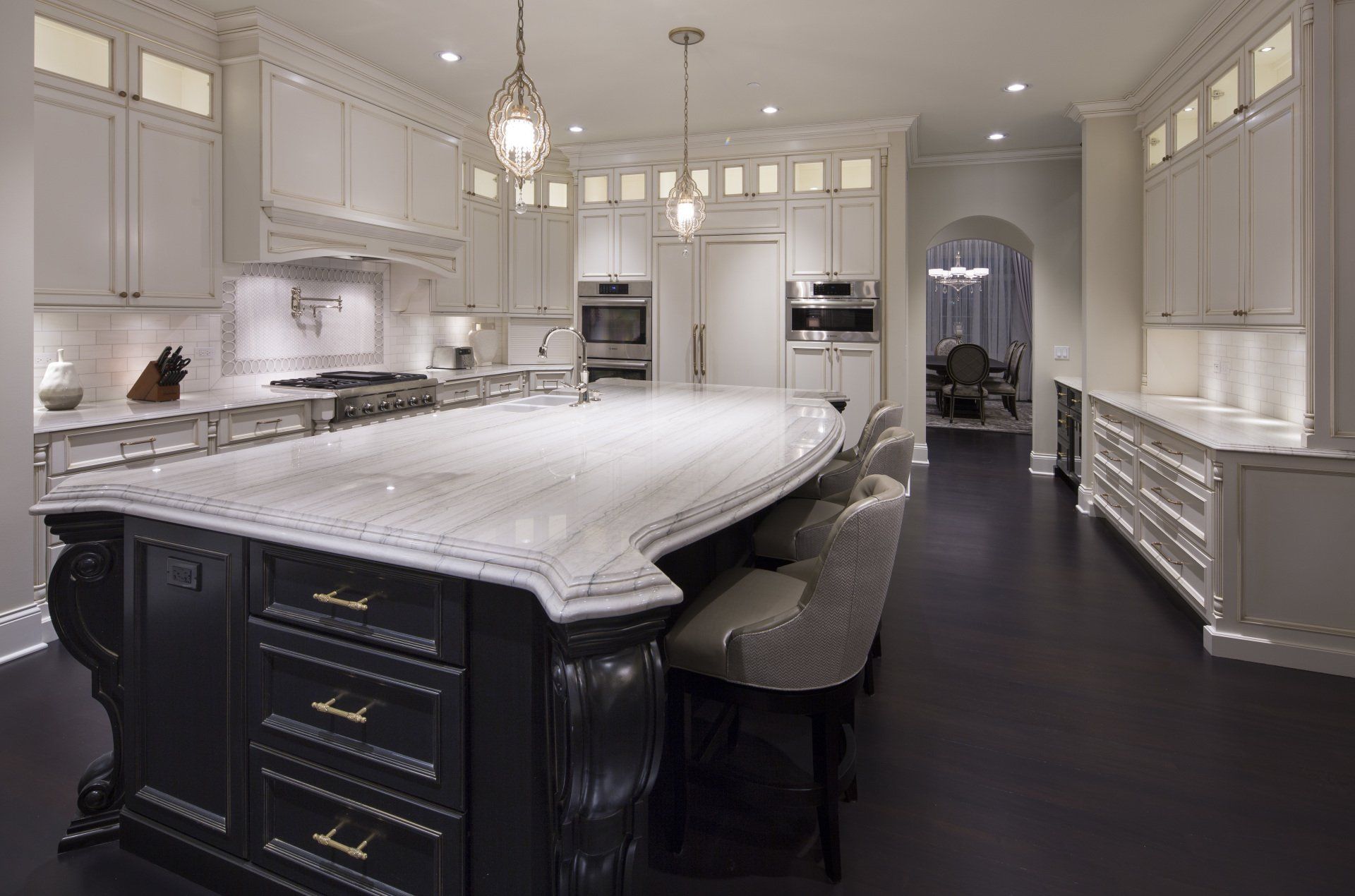 There is a large island in the middle of the kitchen.