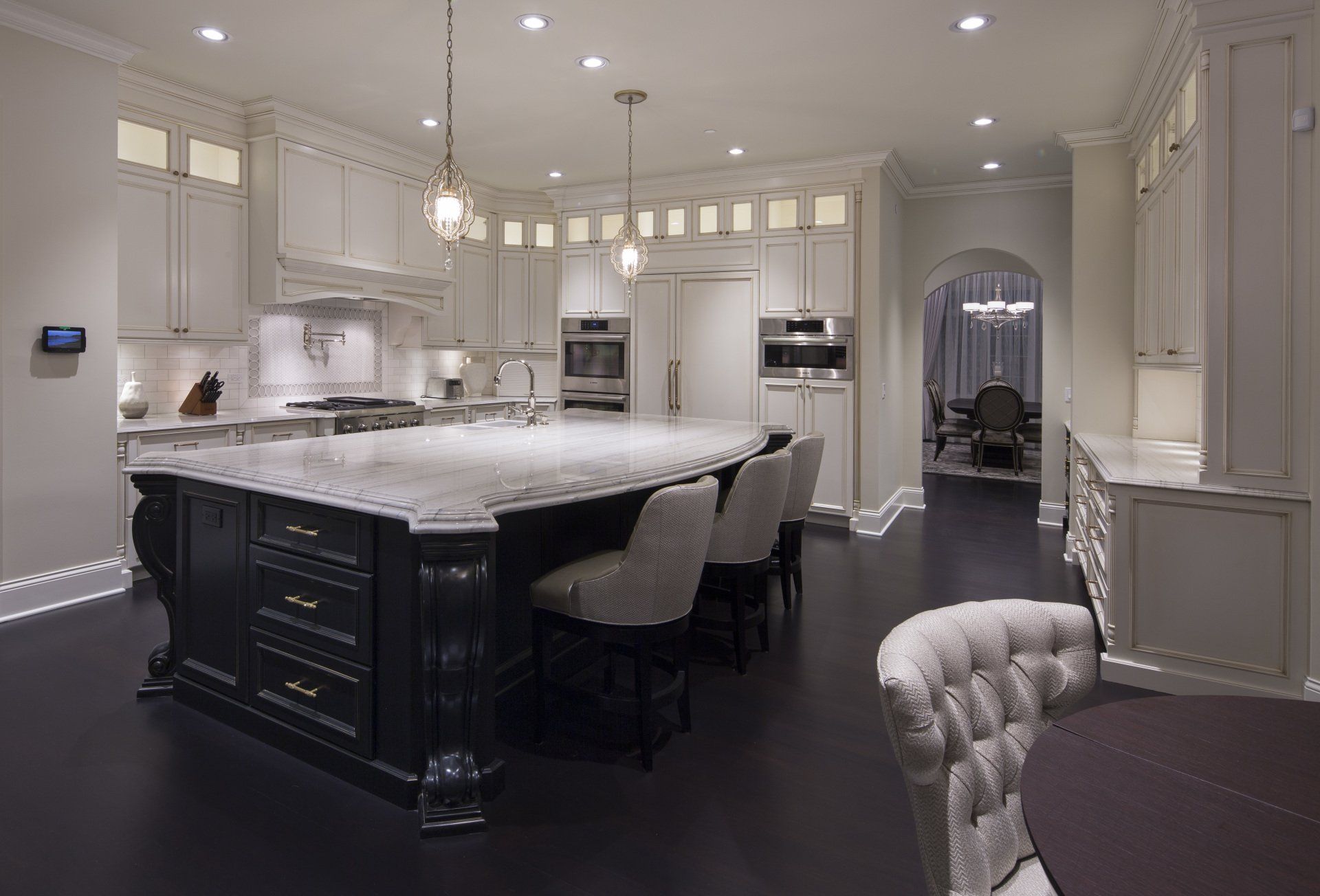 There is a large island in the middle of the kitchen.