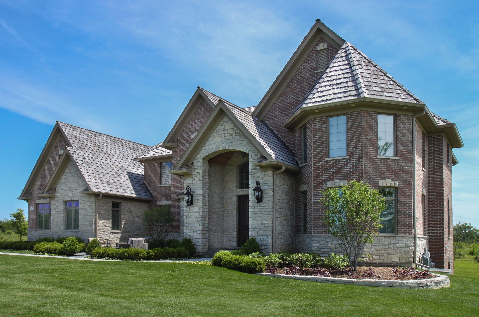 A large brick house with a round roof