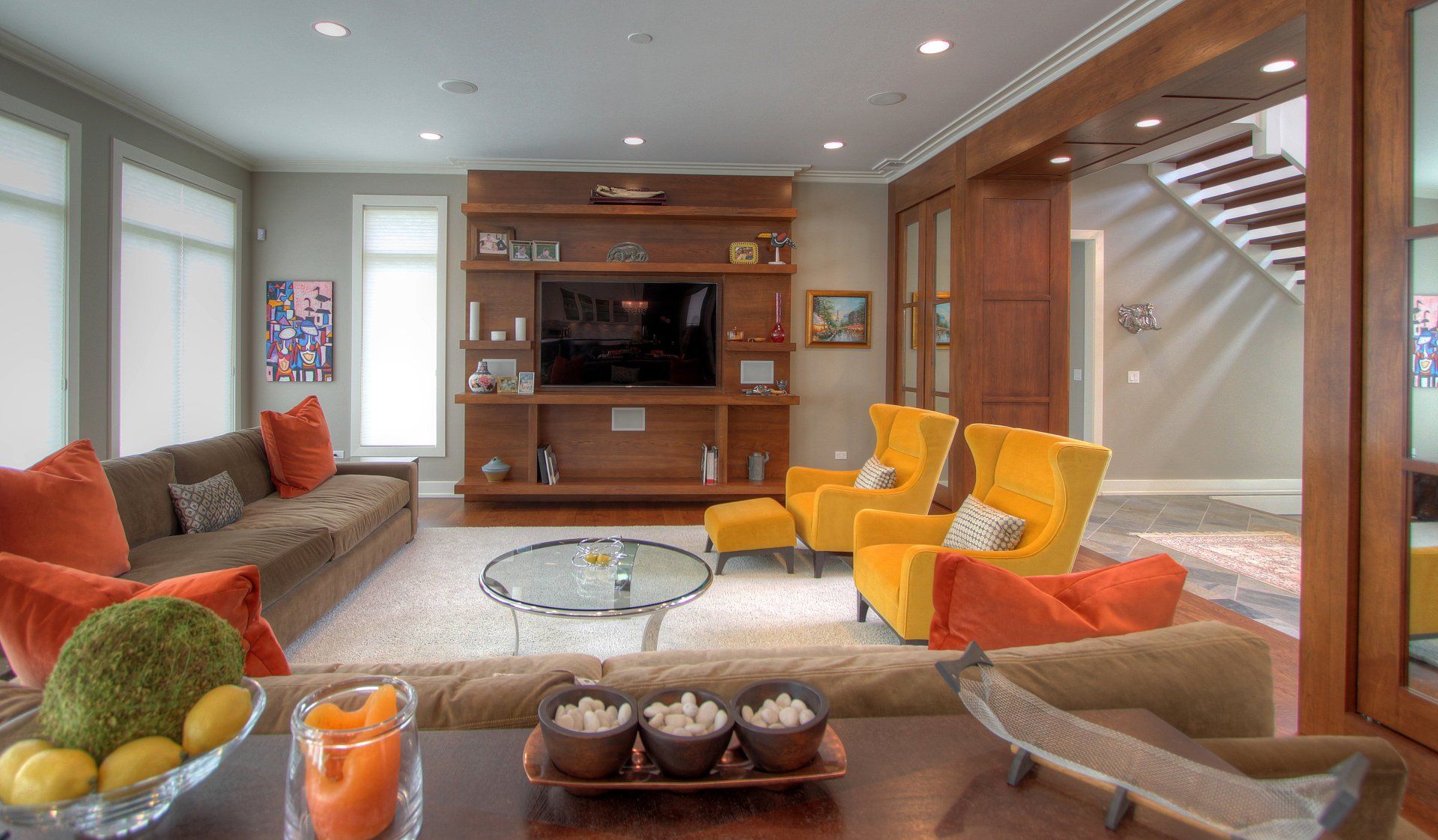 A living room filled with furniture and a flat screen tv.