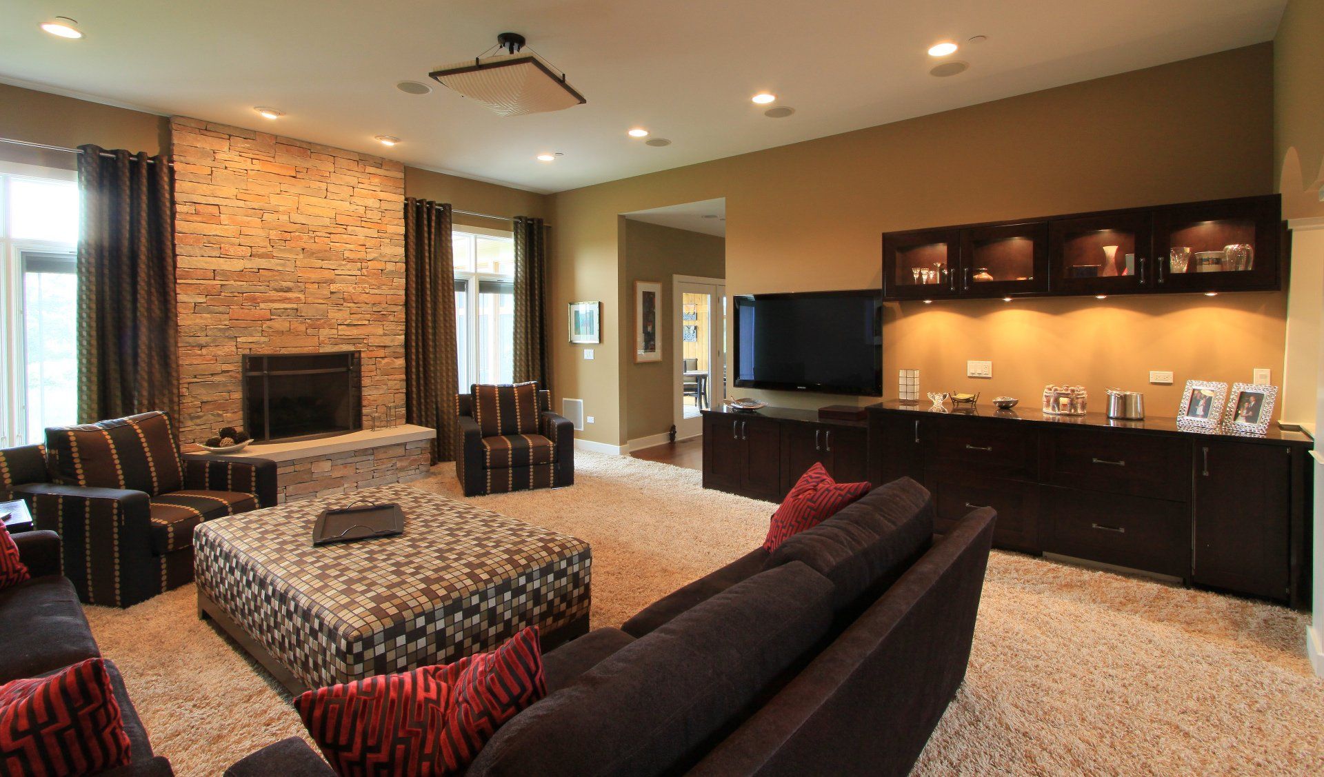 A living room filled with furniture and a flat screen tv