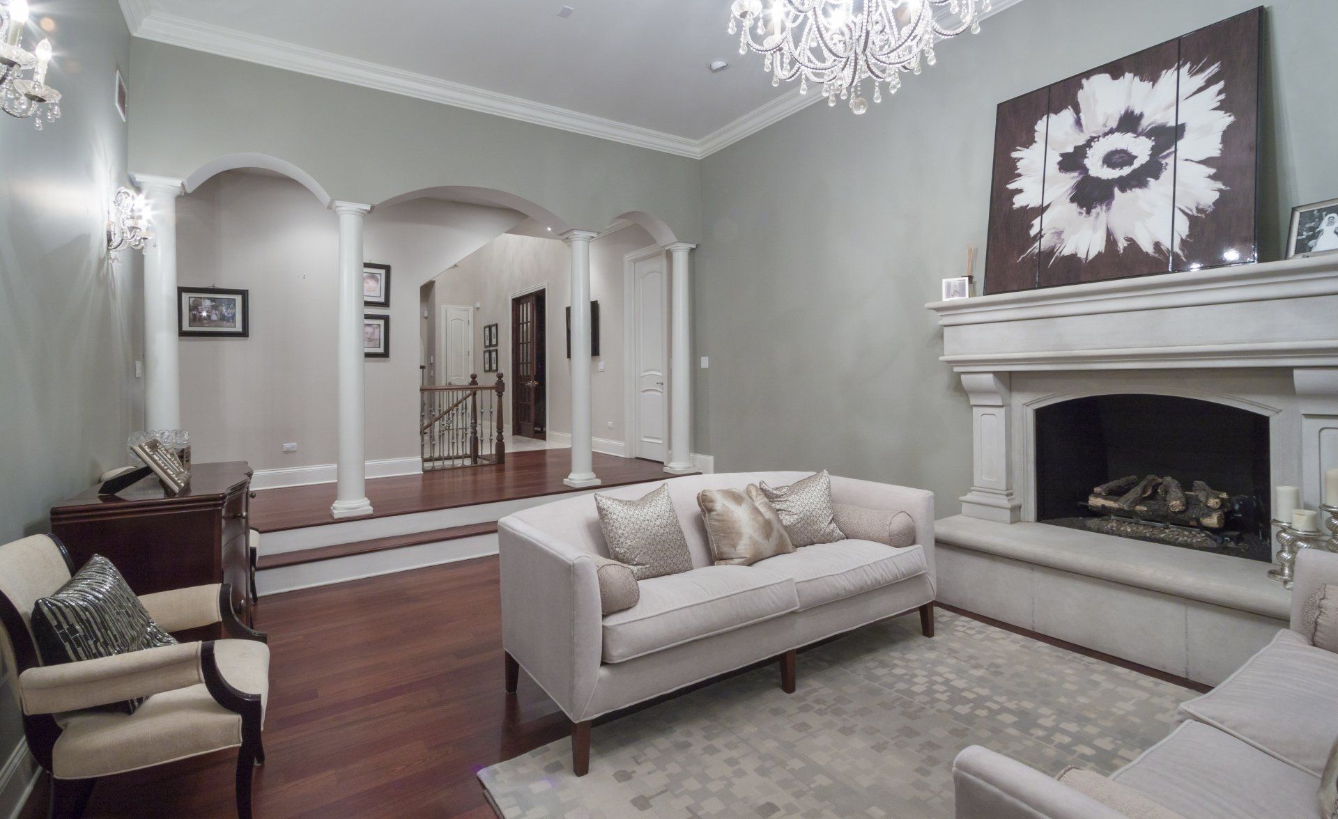 A living room with a fireplace and a couch