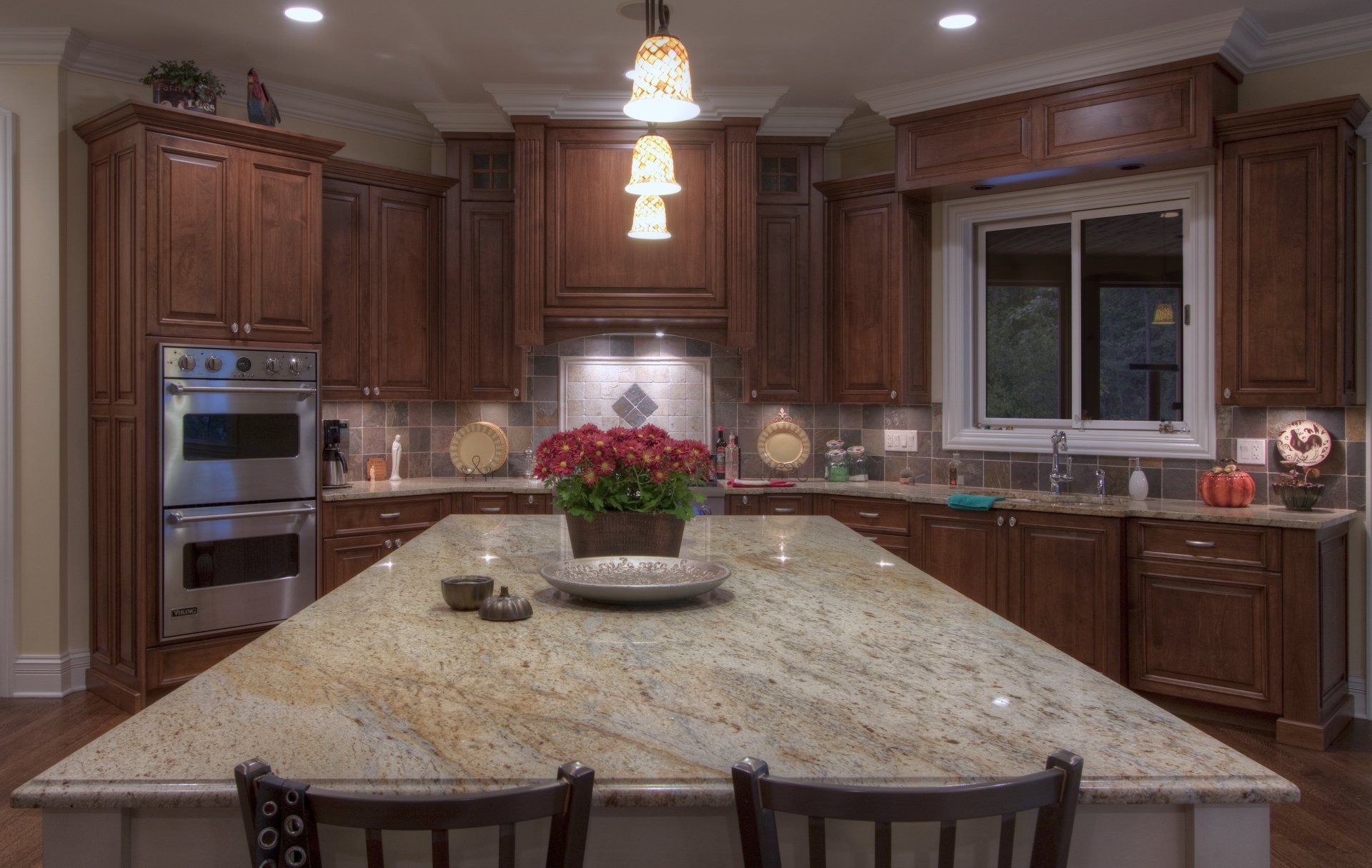 There is a large island in the middle of the kitchen.