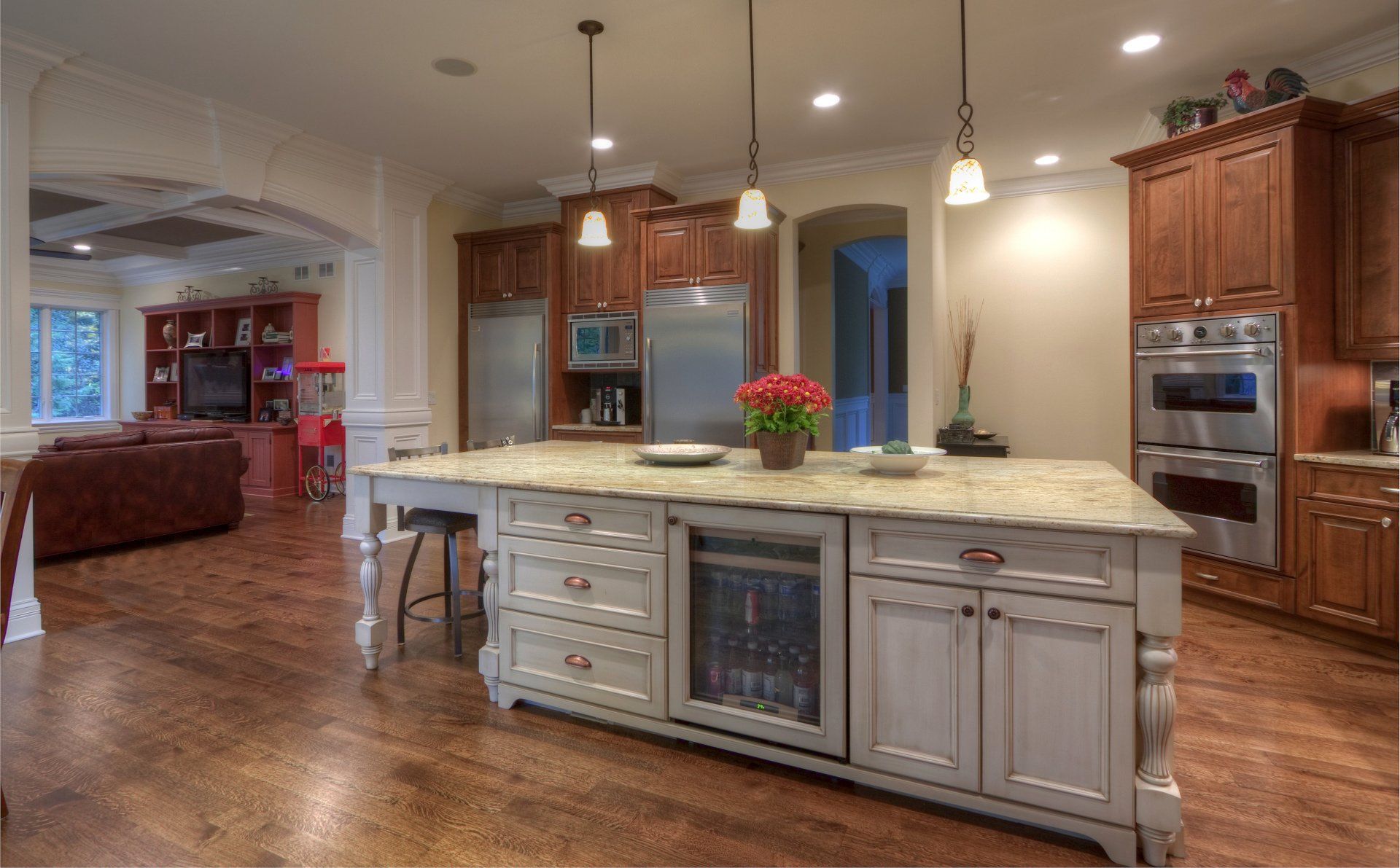 There is a large island in the middle of the kitchen.