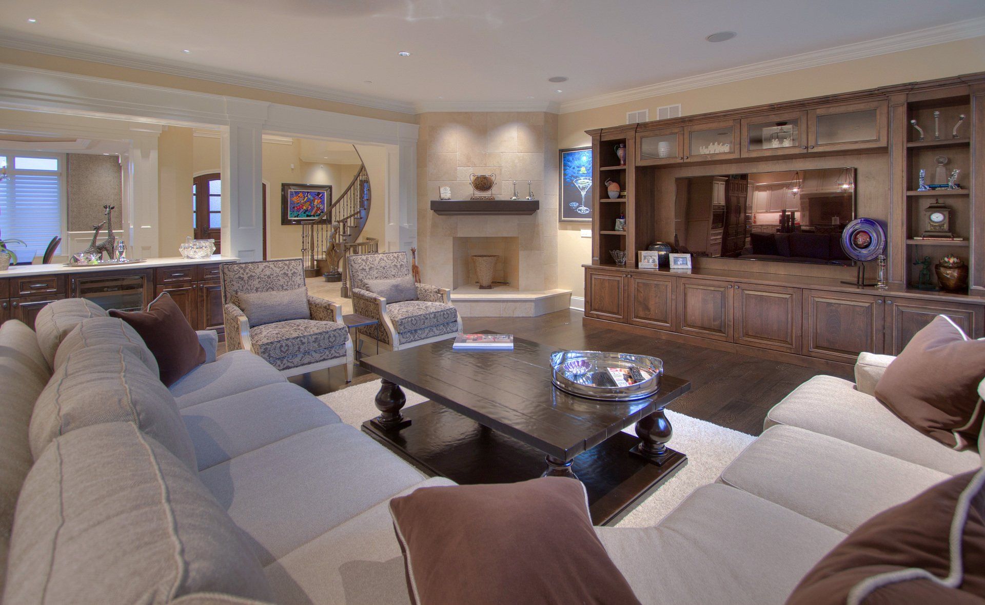 A living room filled with furniture and a fireplace