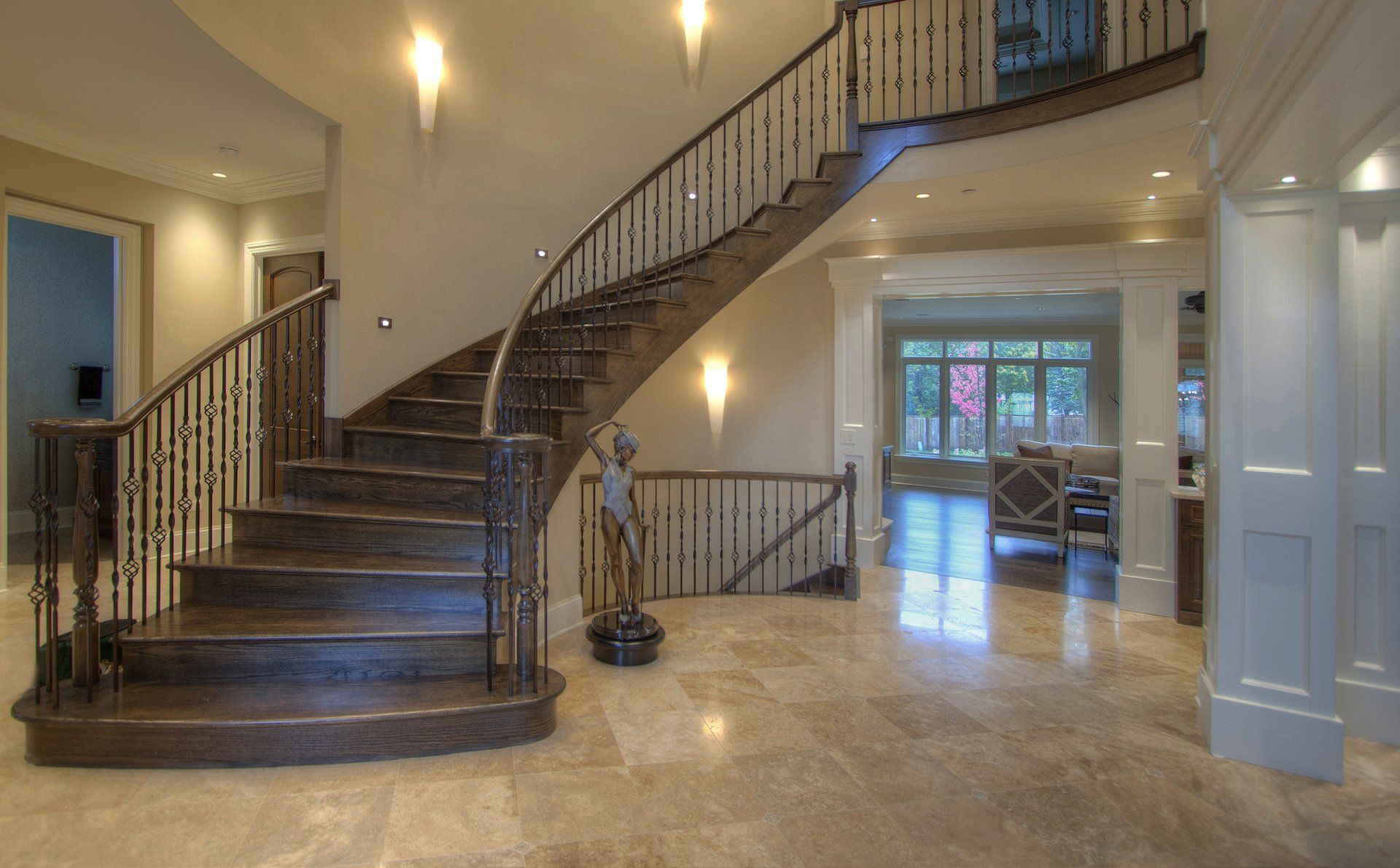 There is a large staircase in the middle of the room.