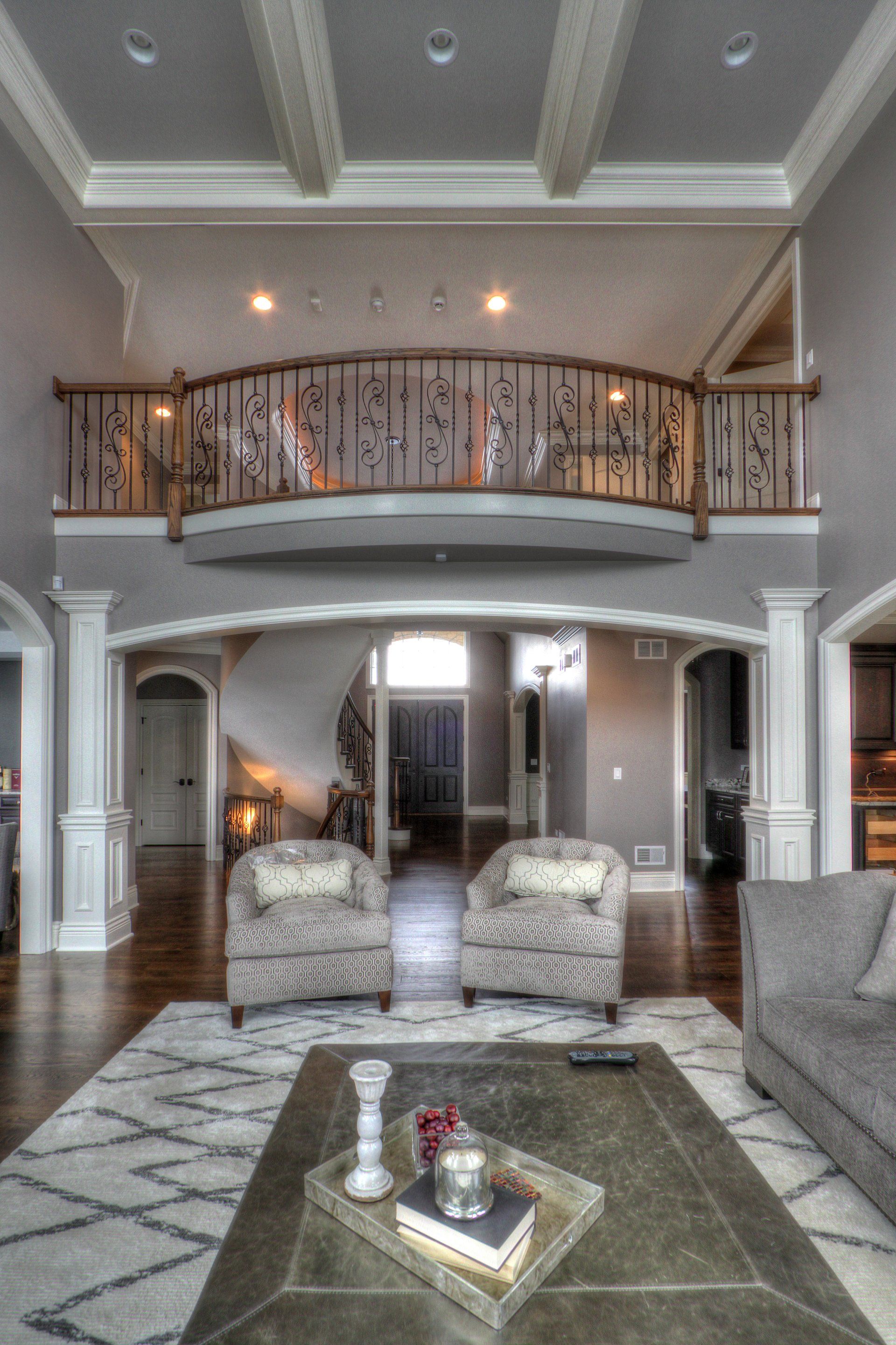 A living room with two chairs and a coffee table