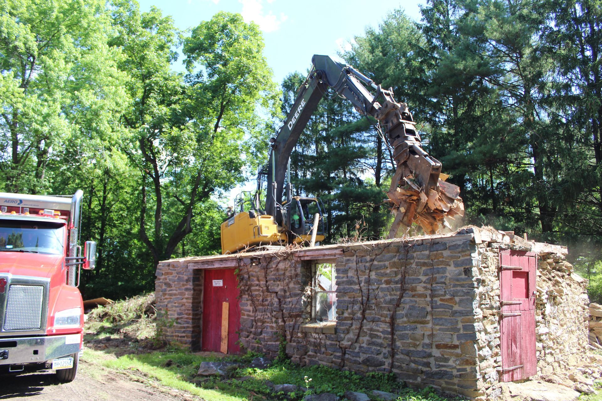 Taking down the old barn.