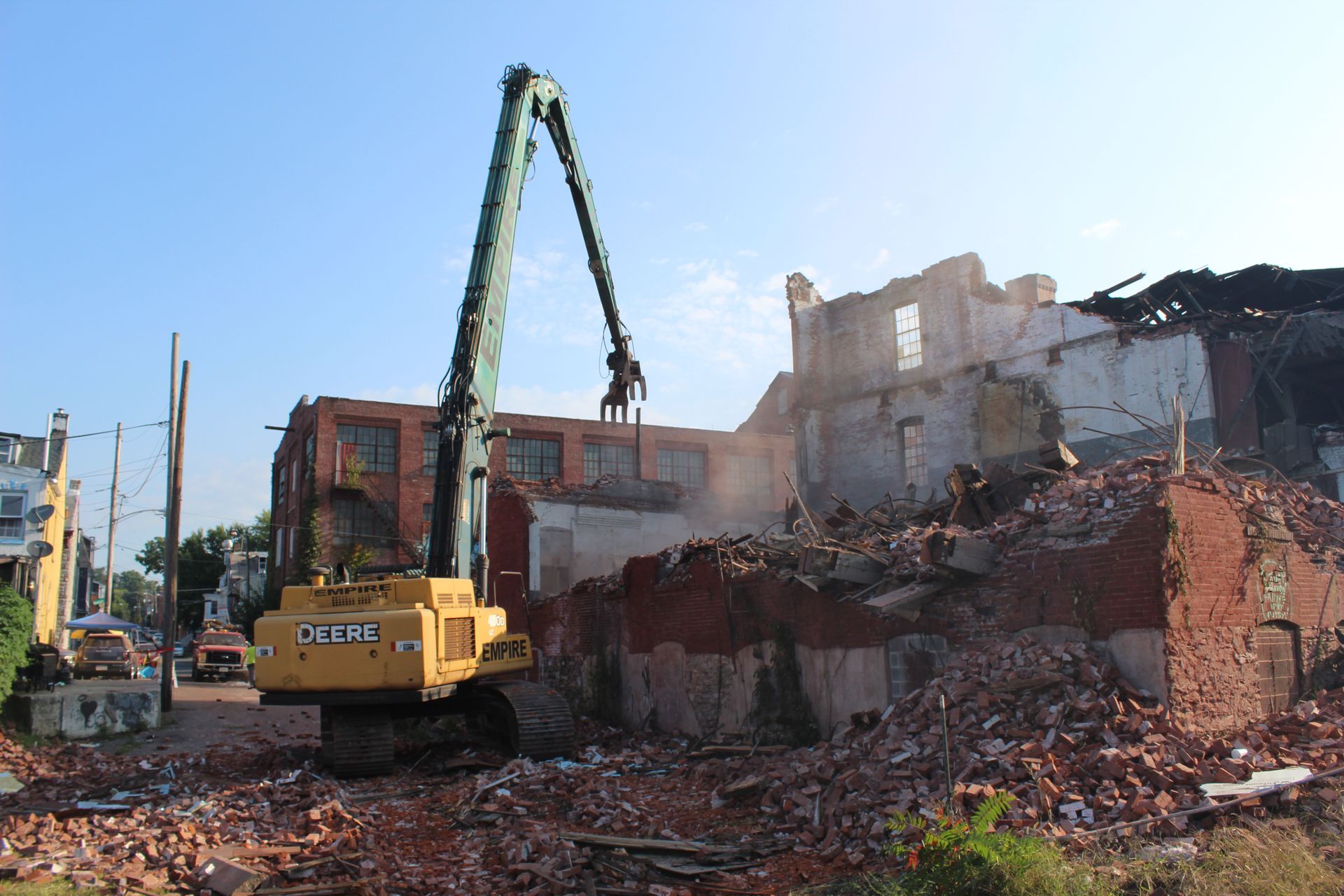 Empire Services demolished an old factory because the second and third floors collapsed due to age. An emergency demolition. 