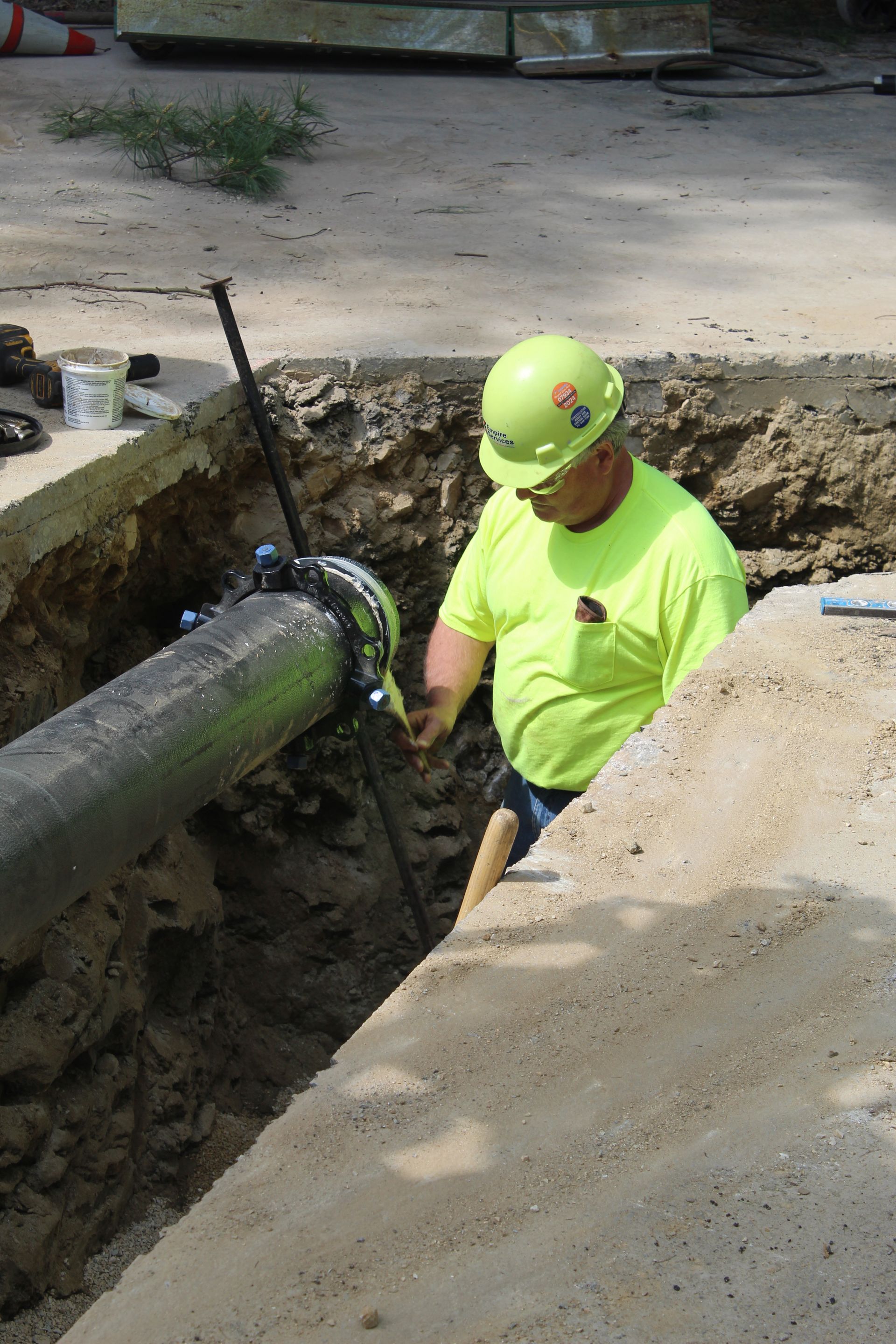 Empire Services digging a trench for the water service.