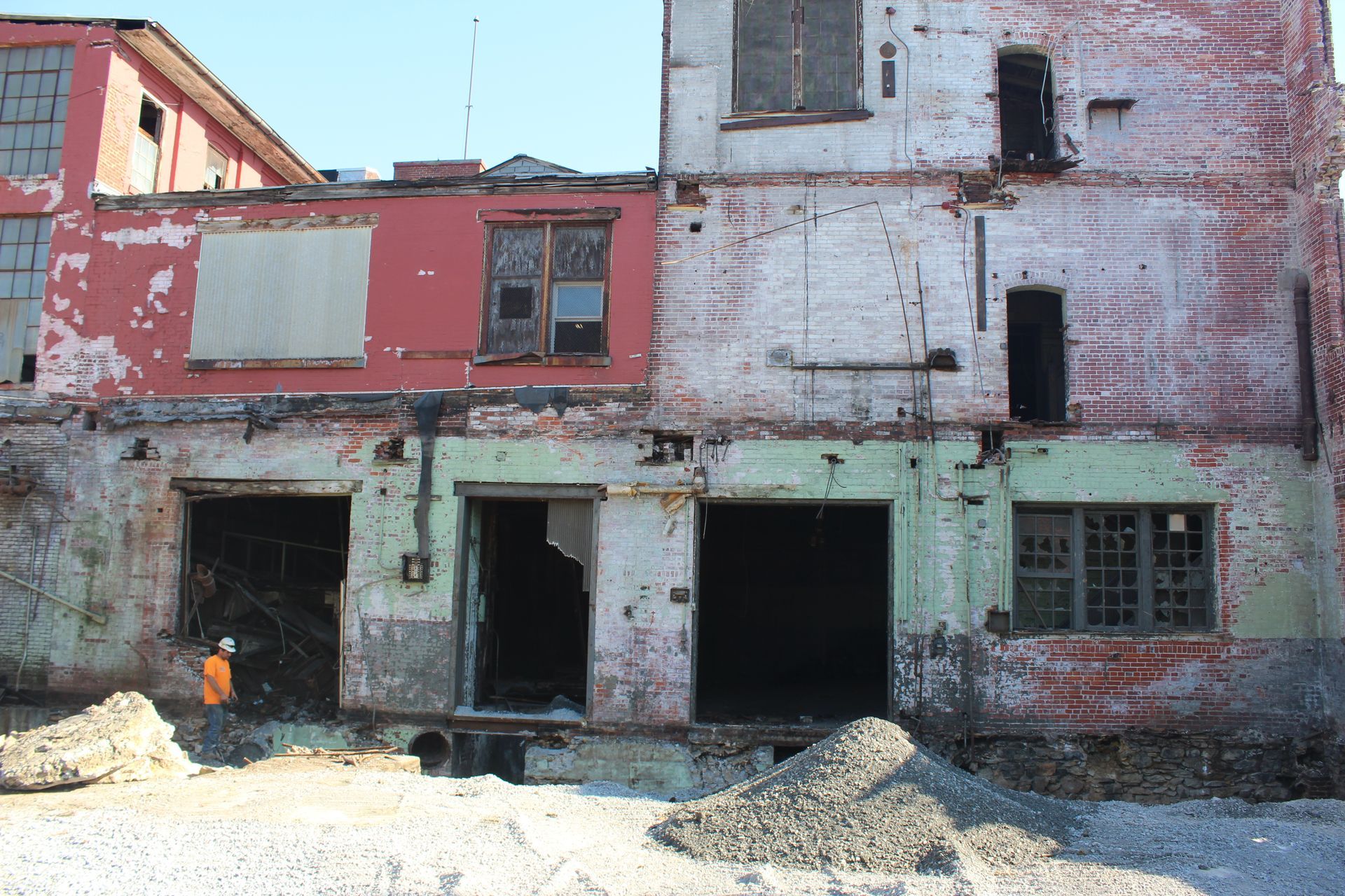 The Empire Services team demolished structures in front of the buildings that will remain and eventually be repurposed. 
