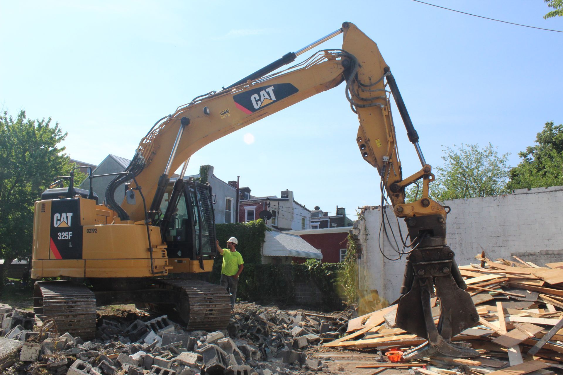Loading demolition debris into a DVC truck.