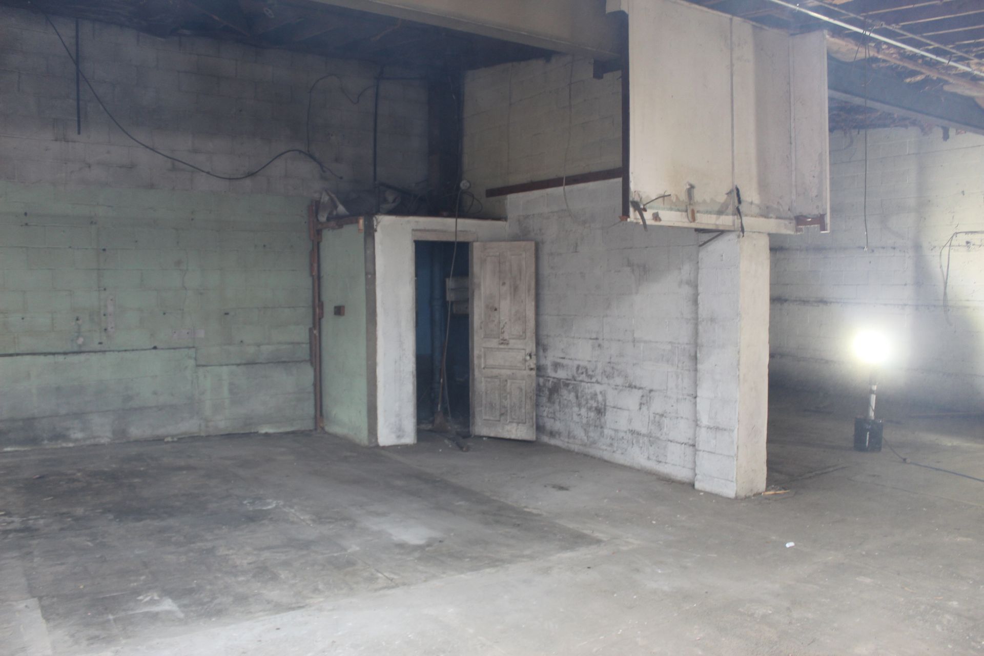 The interior demolition of the garage is completed by Empire Services.