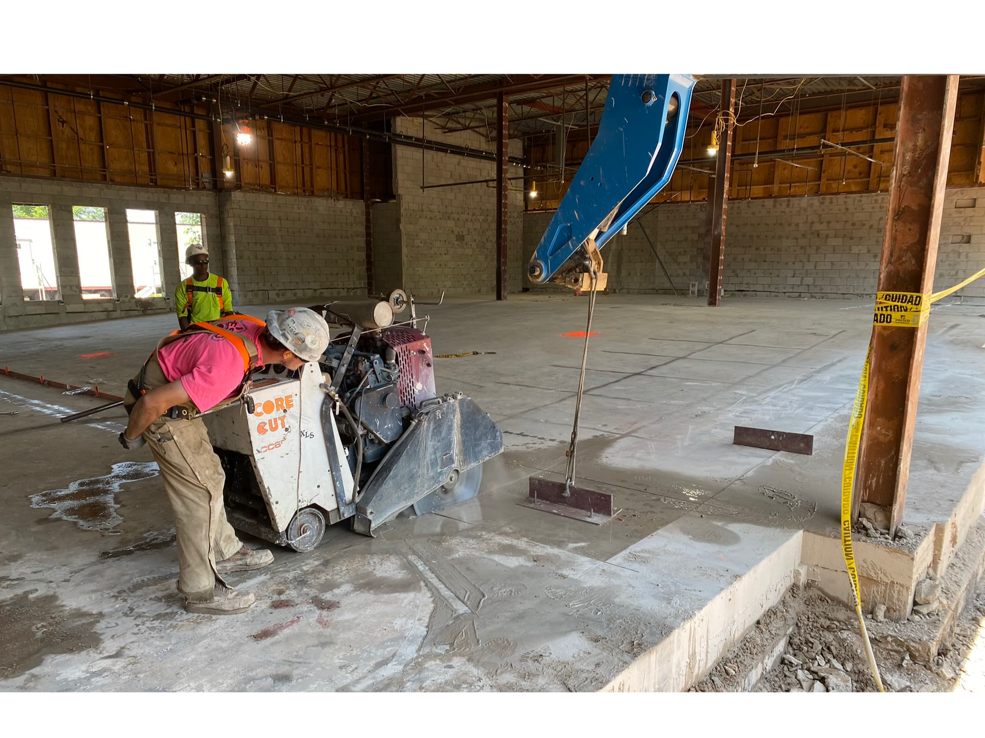 Removing concrete during an interior demolition.
